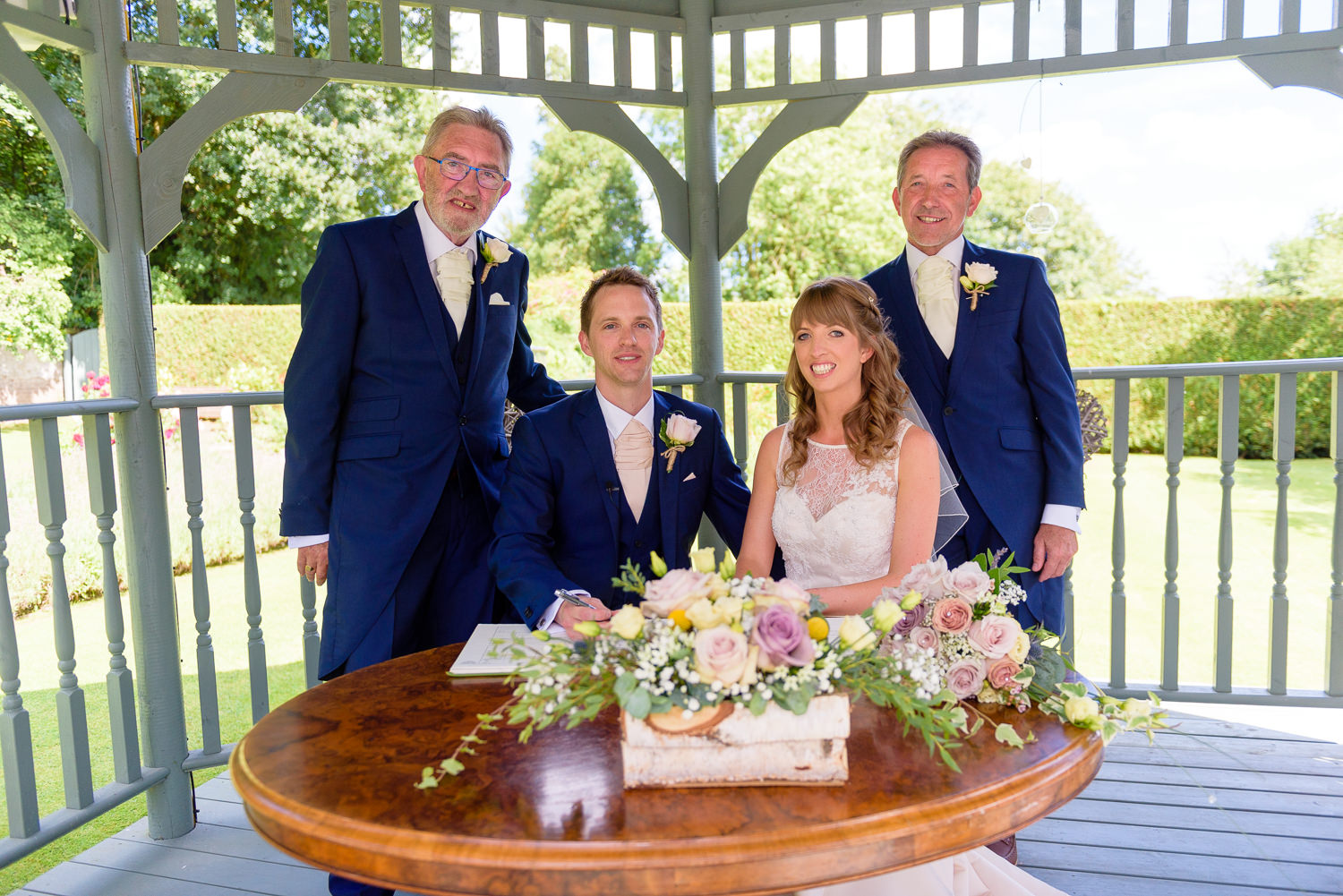 Signing the register at Callow Hall wedding