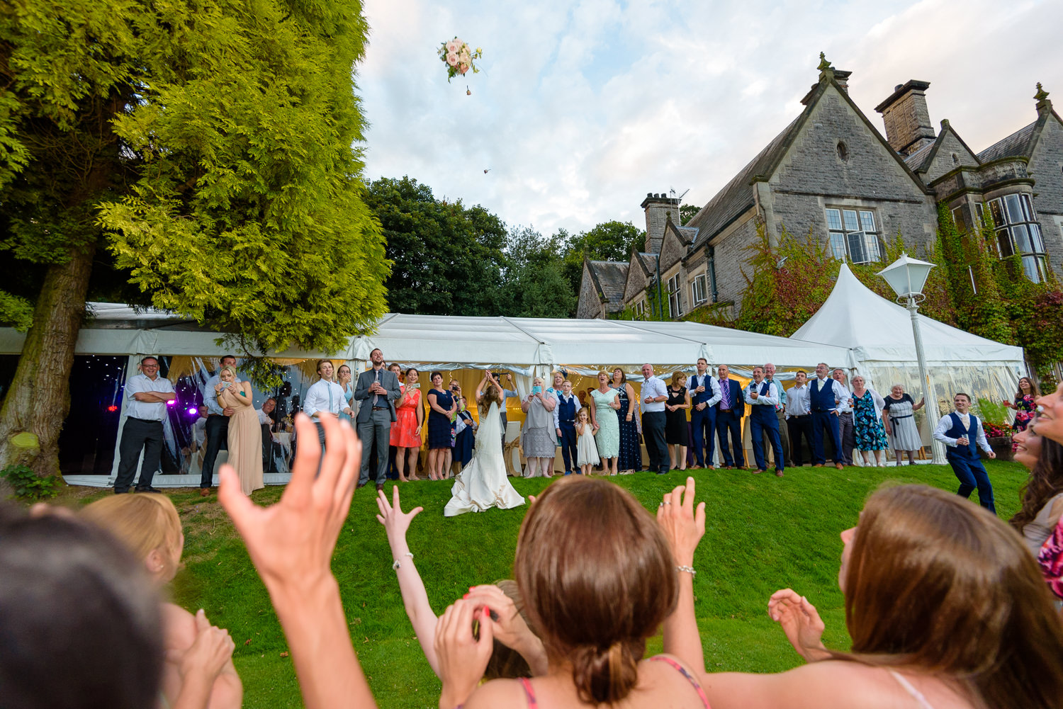 Bride throws her bouquet at Callow Hall