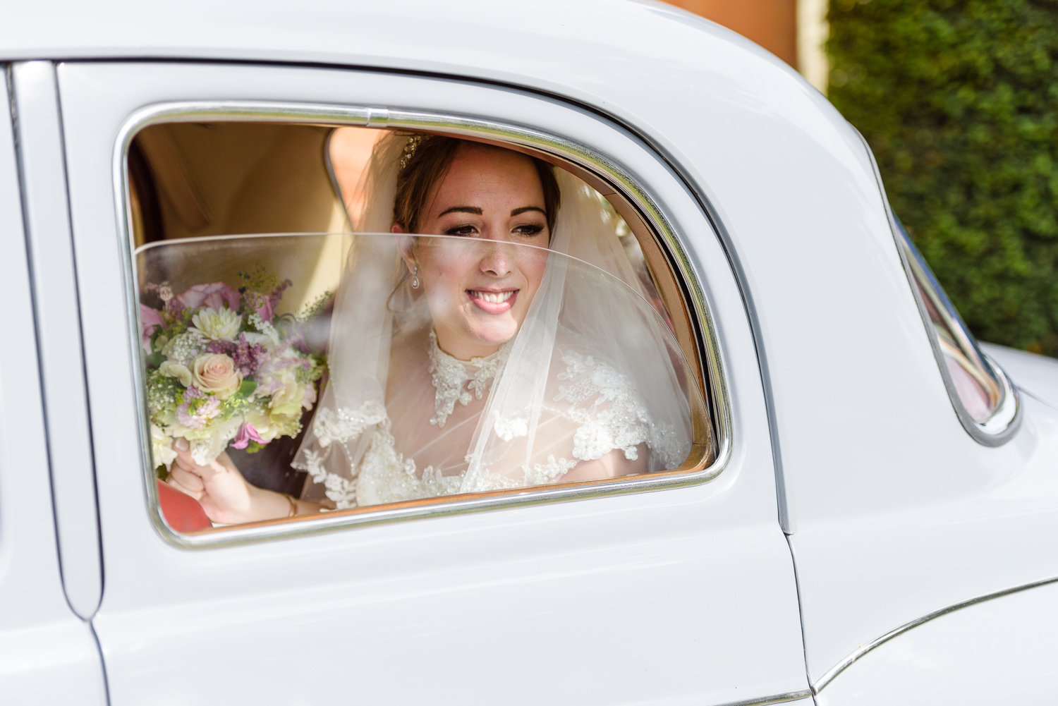 Bride arriving at Langar Hall for her wedding