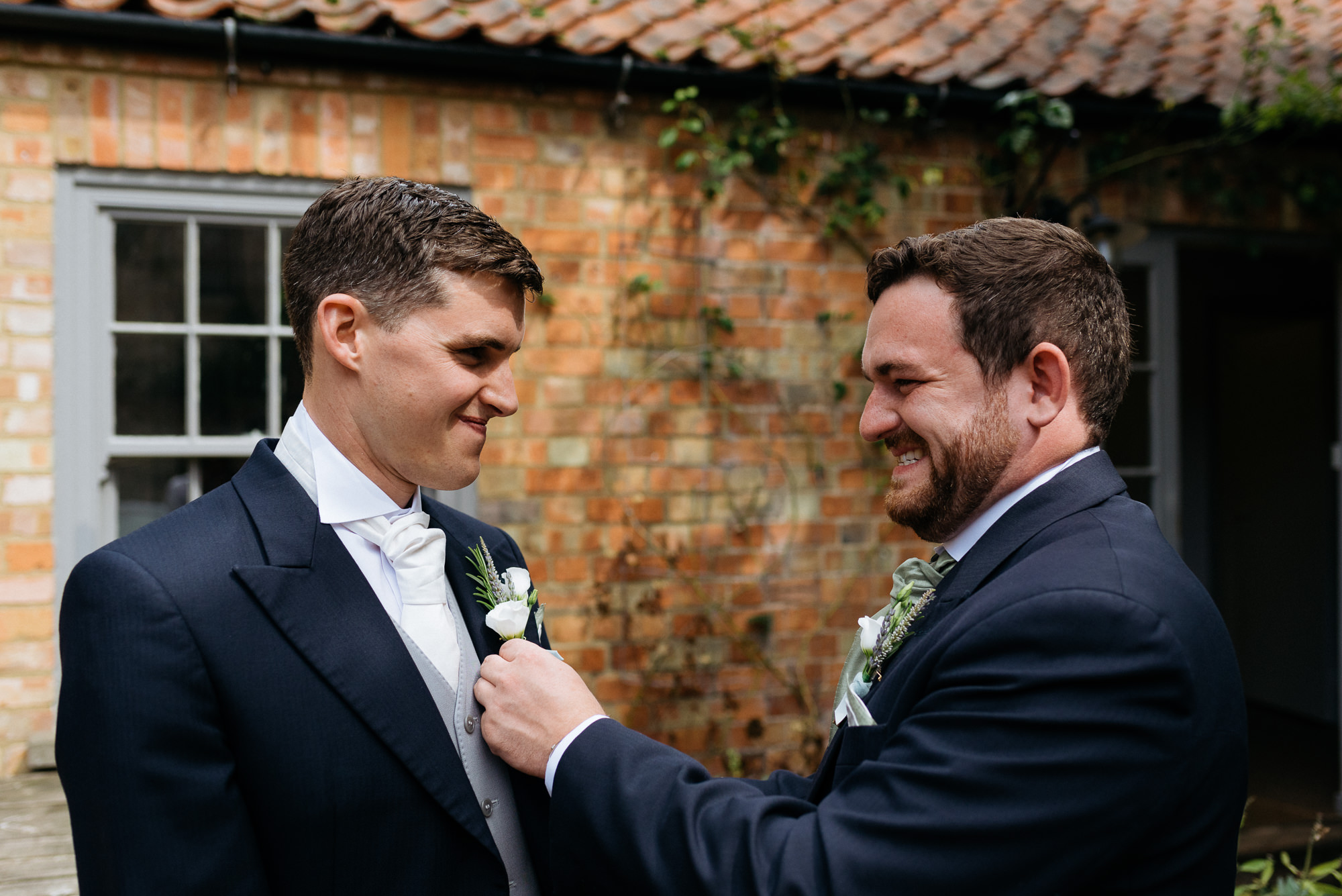 Groom and bestman at Narborough Hall Gardens