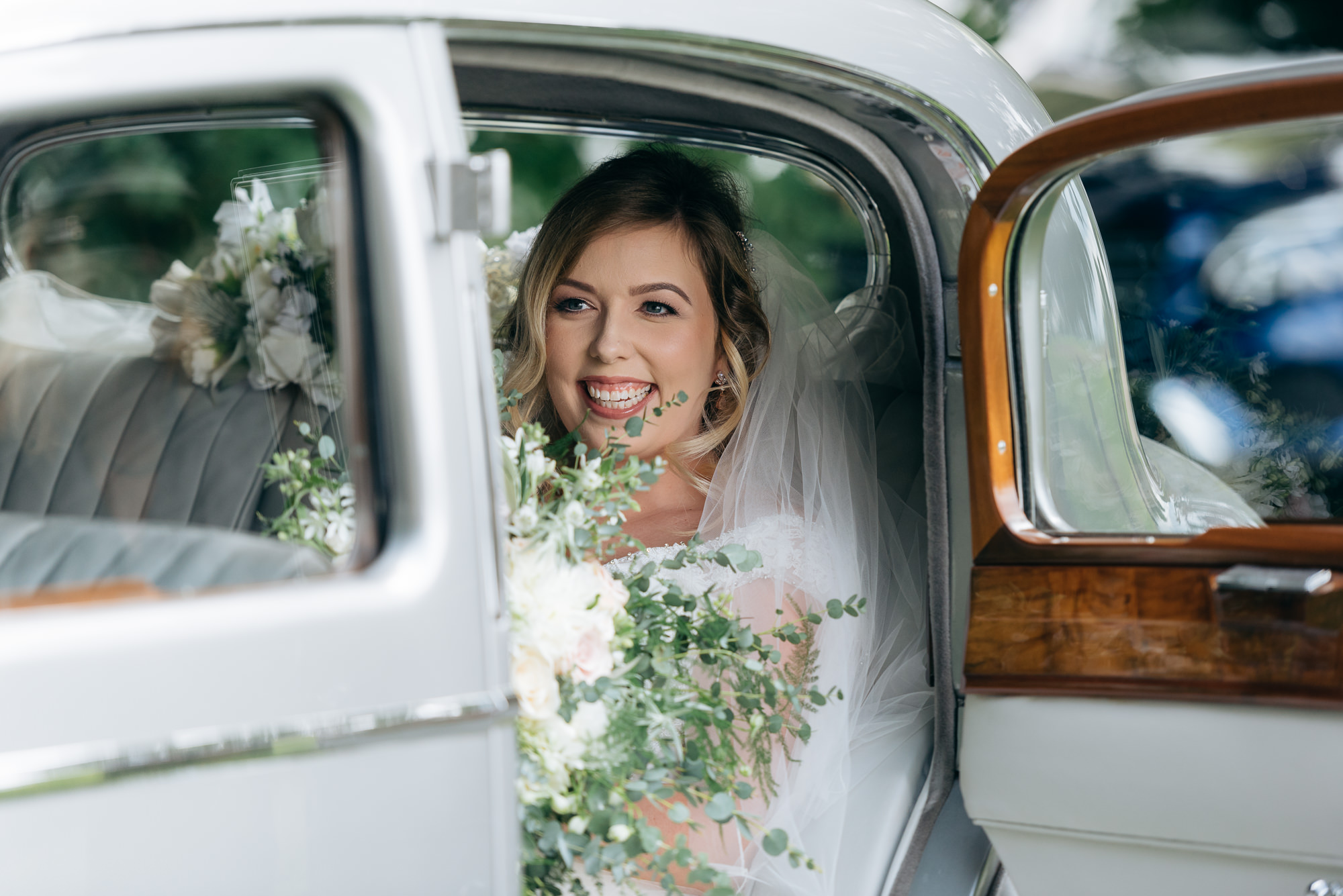 Bride arriving at Narborough Hall Gardens wedding