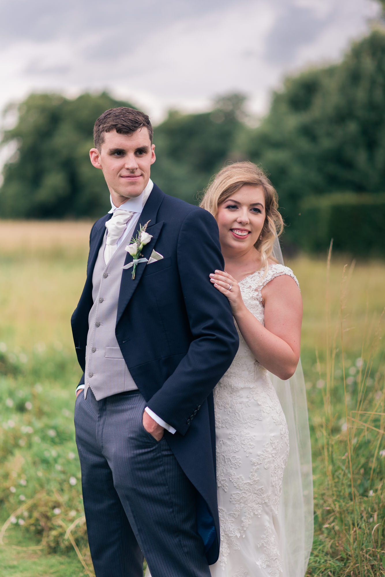 bride and groom on their wedding day at Narborough Hall Gardens in Norfolk
