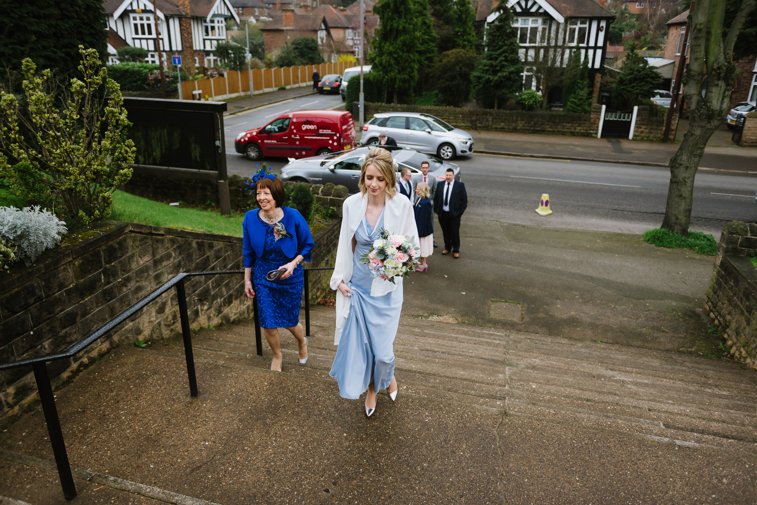 bridesmaid arrives at Good Shepherd Church in Woodthorpe 