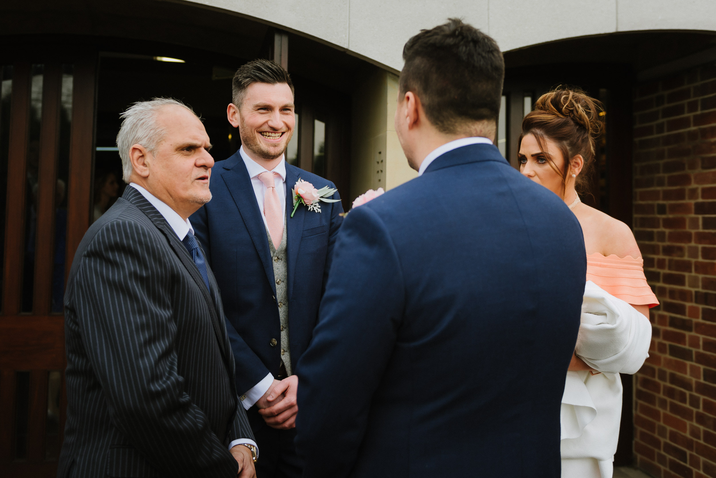 groom and his guests talking