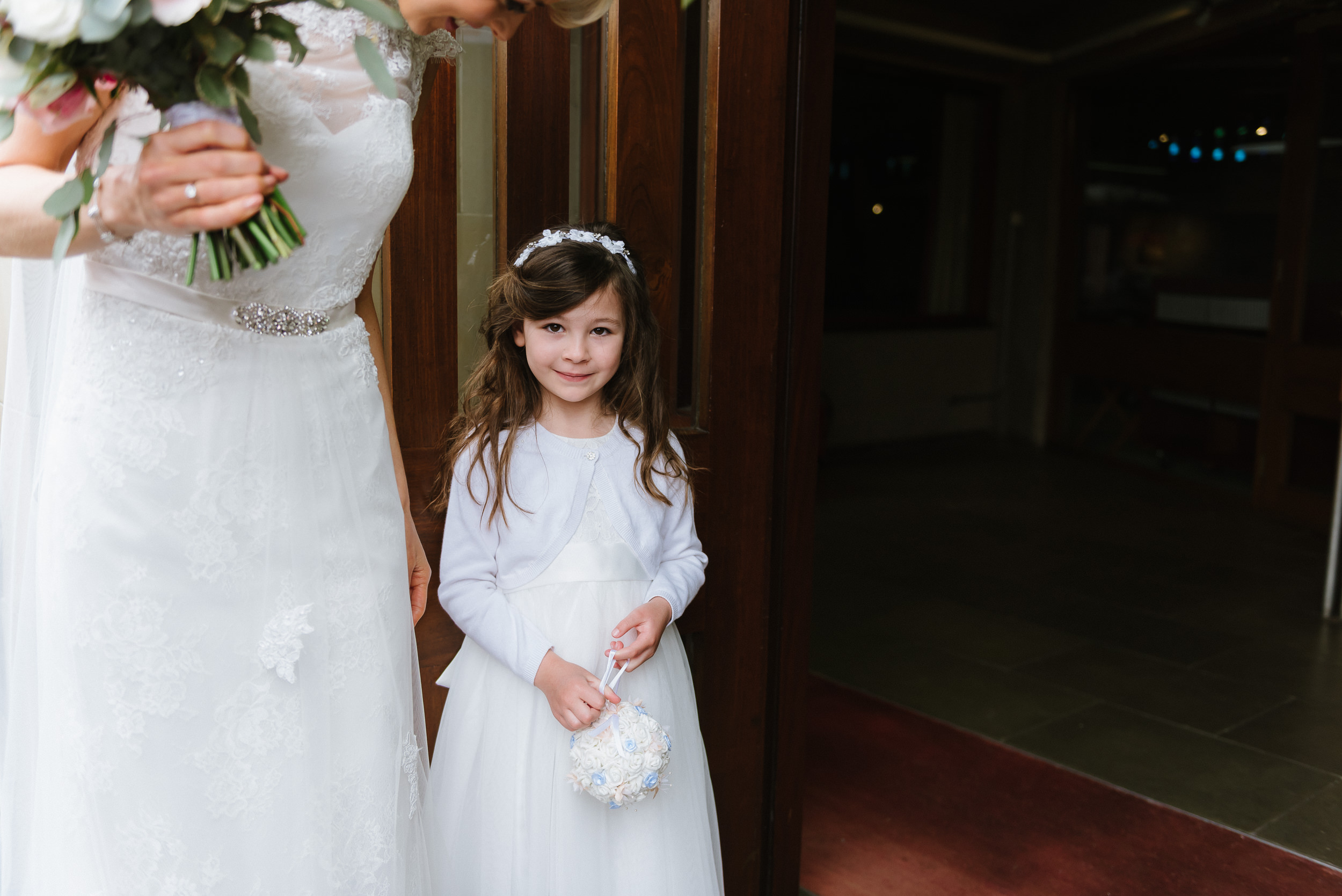 Bride and flower girl carriage hall wedding photography