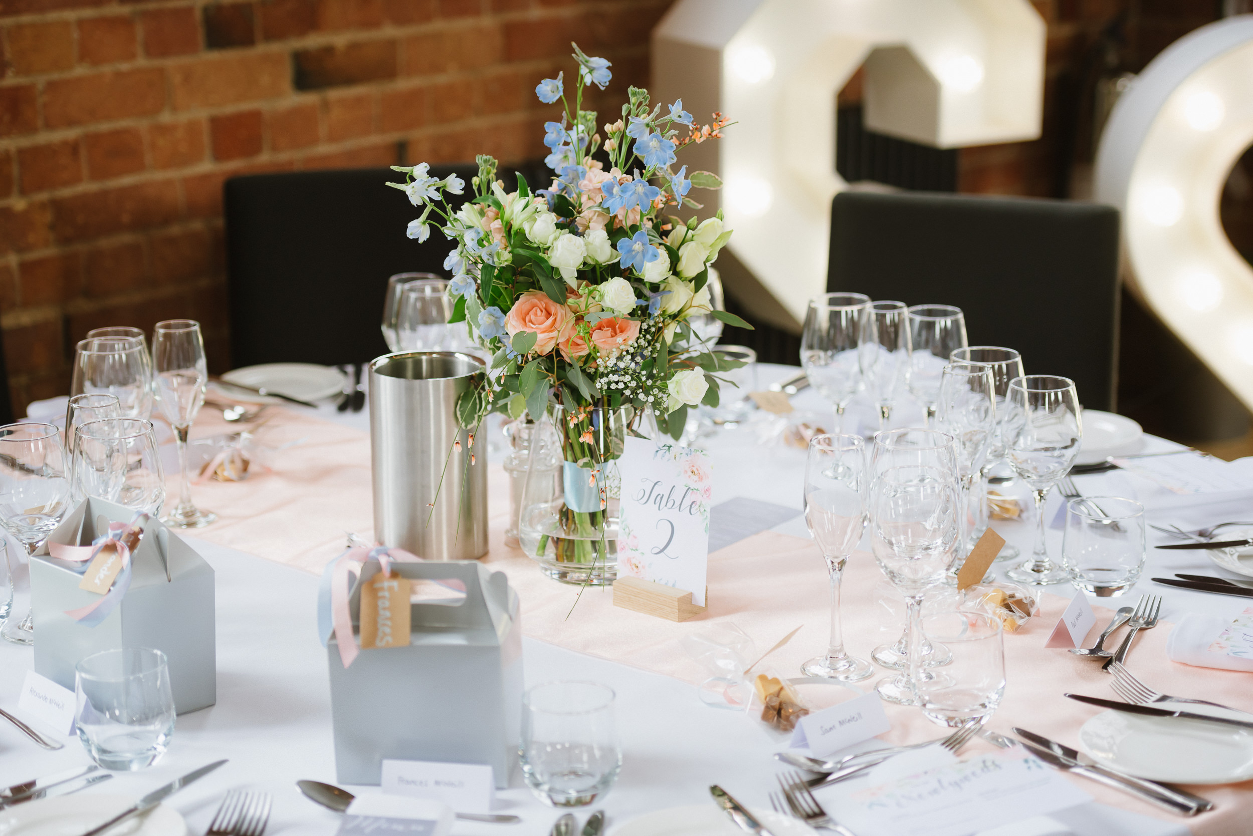 wedding flowers on a table at the Carriage Hall in Plumtree, Nottingham