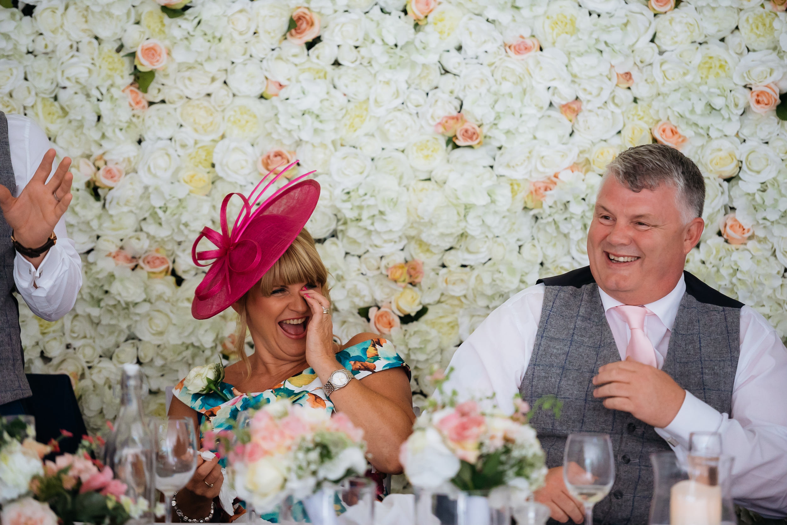 brides mum laughing during the wedding speeches