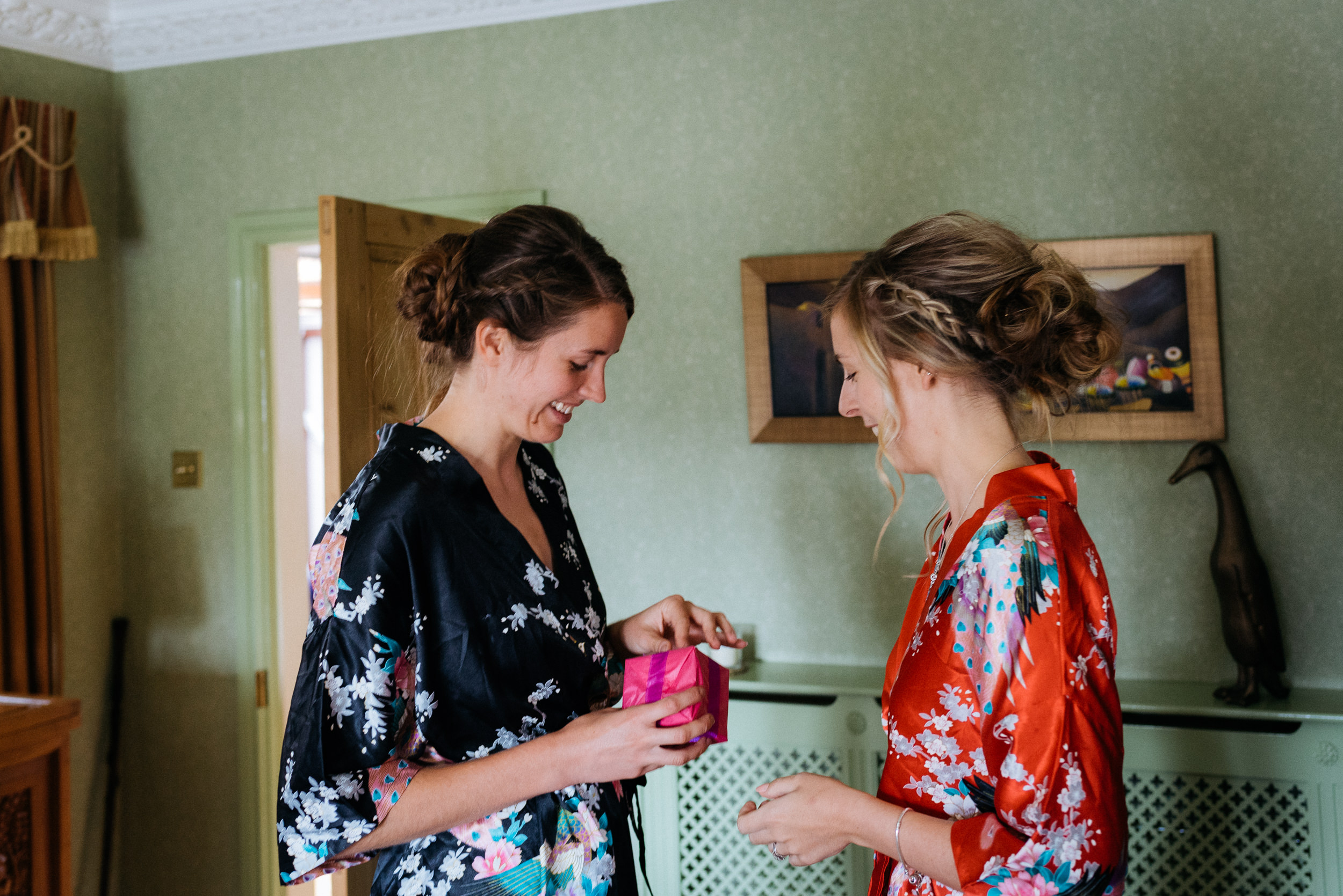 bride giving her maid of honour a gift