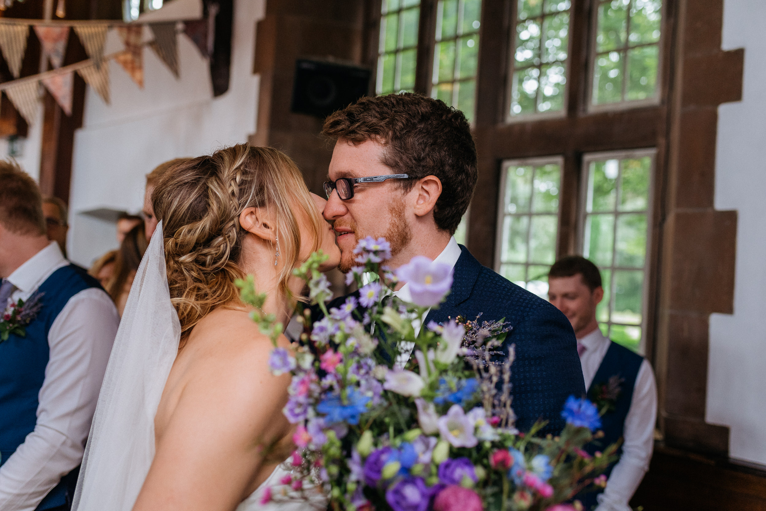 Bride and groom kissing