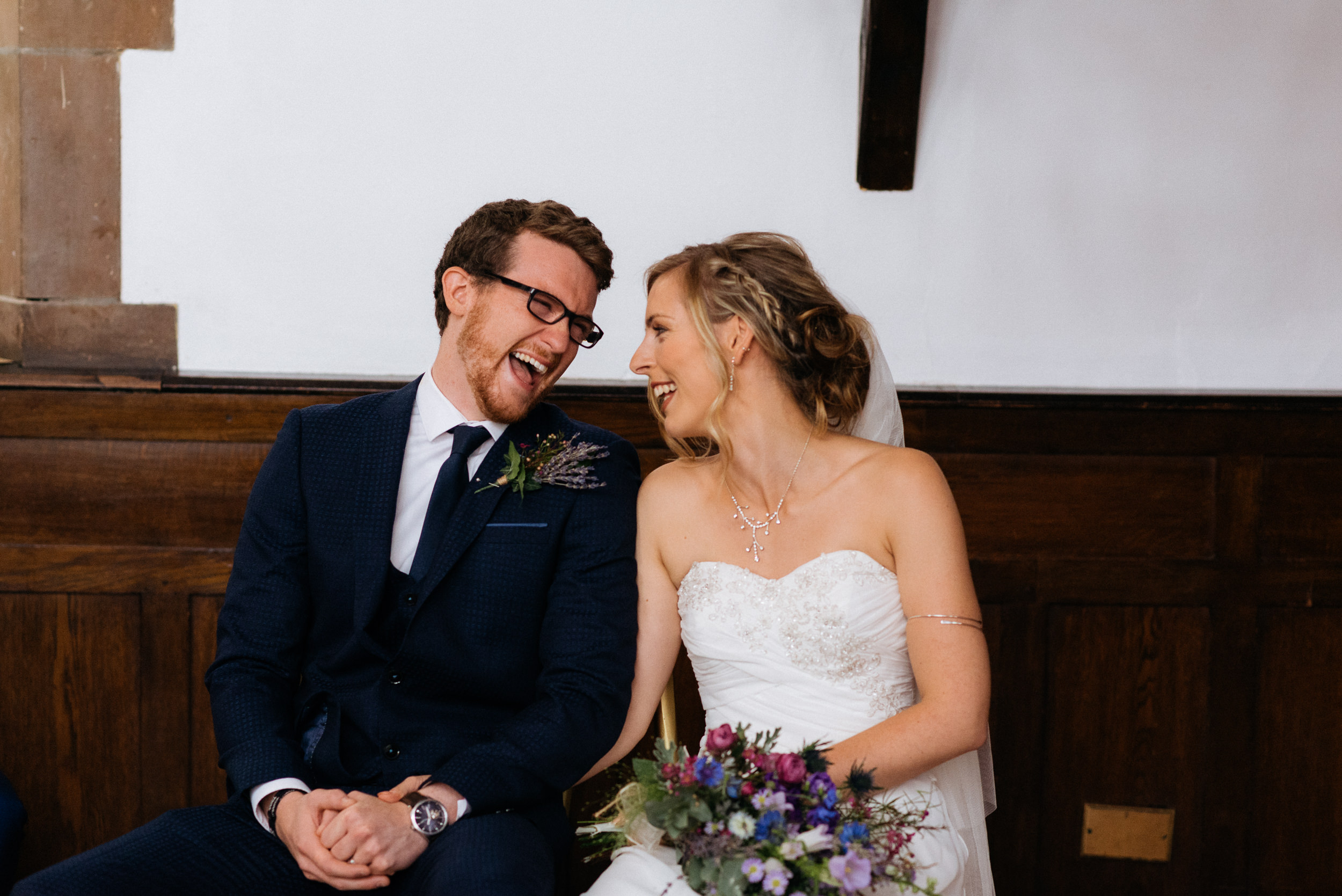 Bride and groom laughing