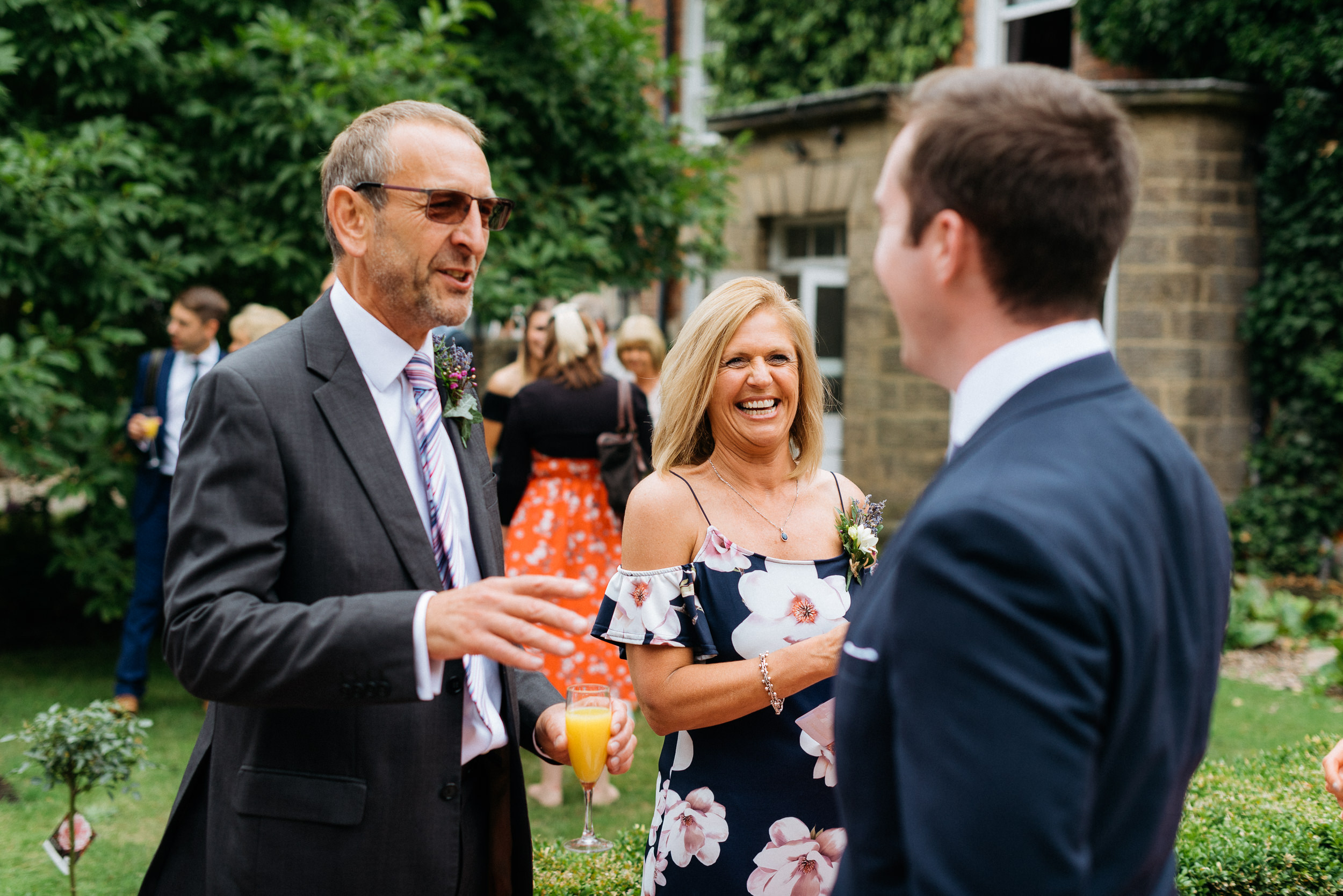 Mother and father of the bride having fun at the wedding