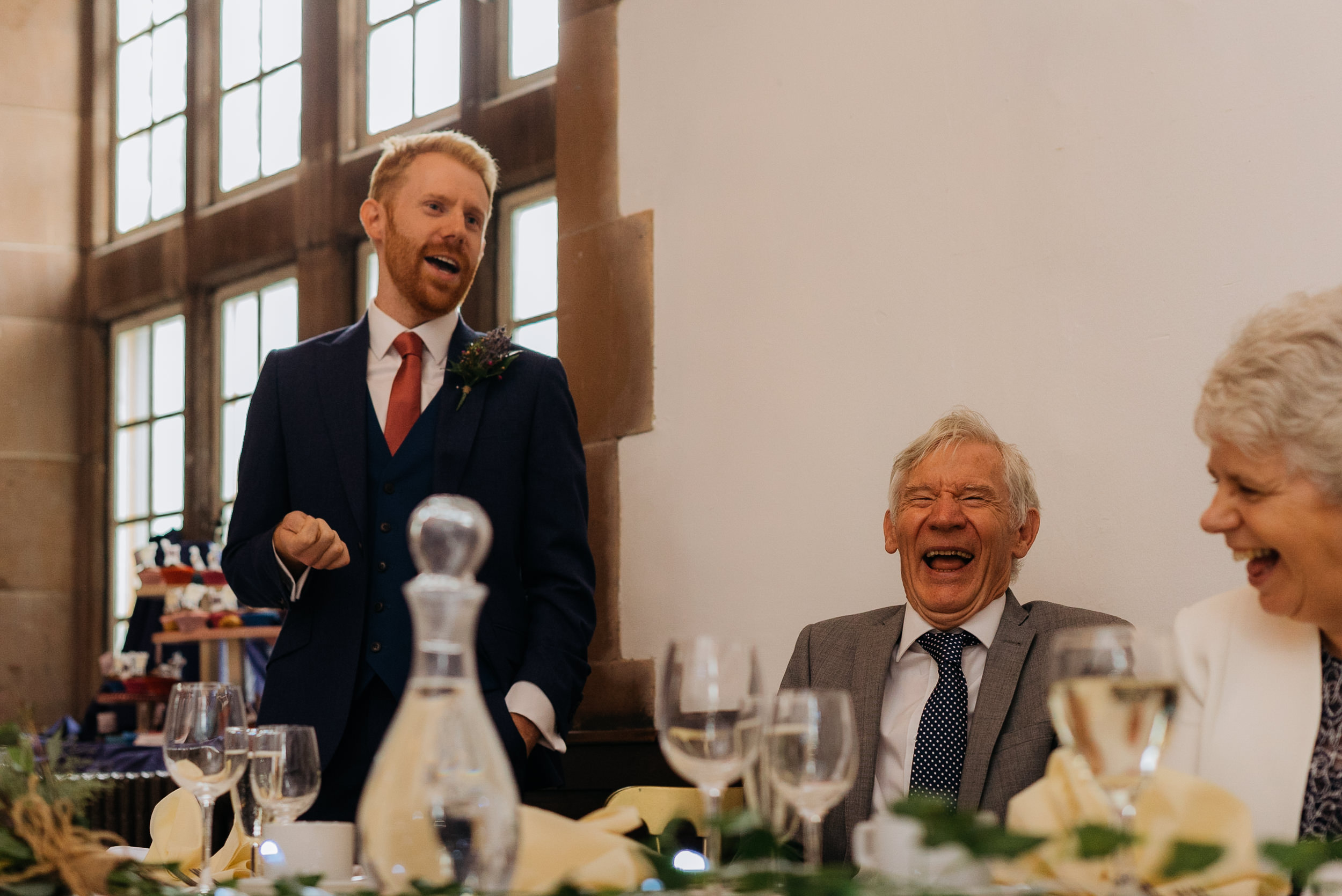 The bestman entertaining the guests as he does his speech