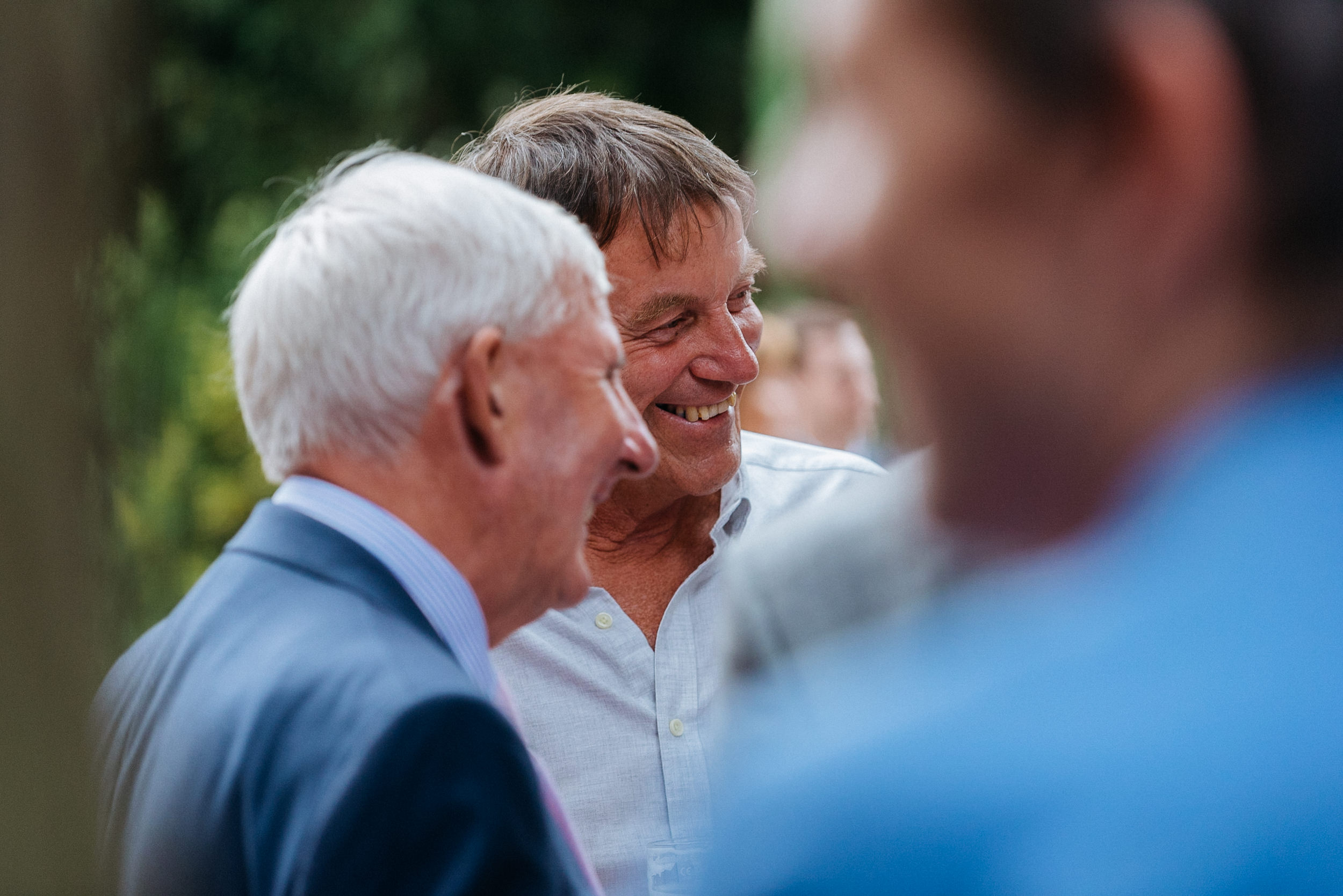 Guests  chatting over a beer