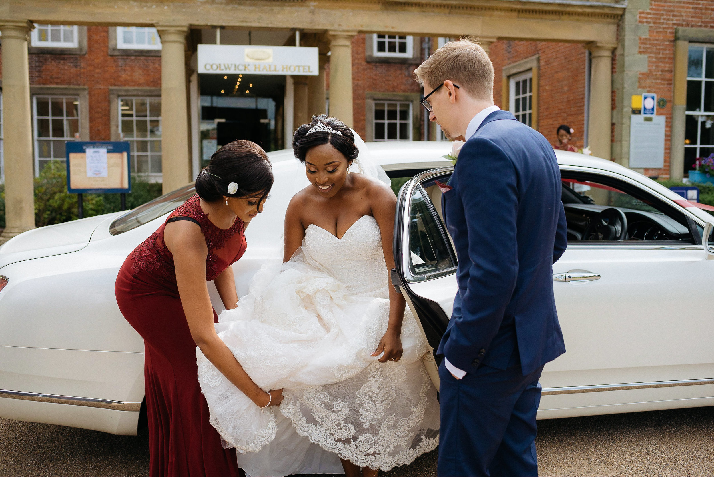 Bride arrives at her wedding reception at Colwick Hall wedding