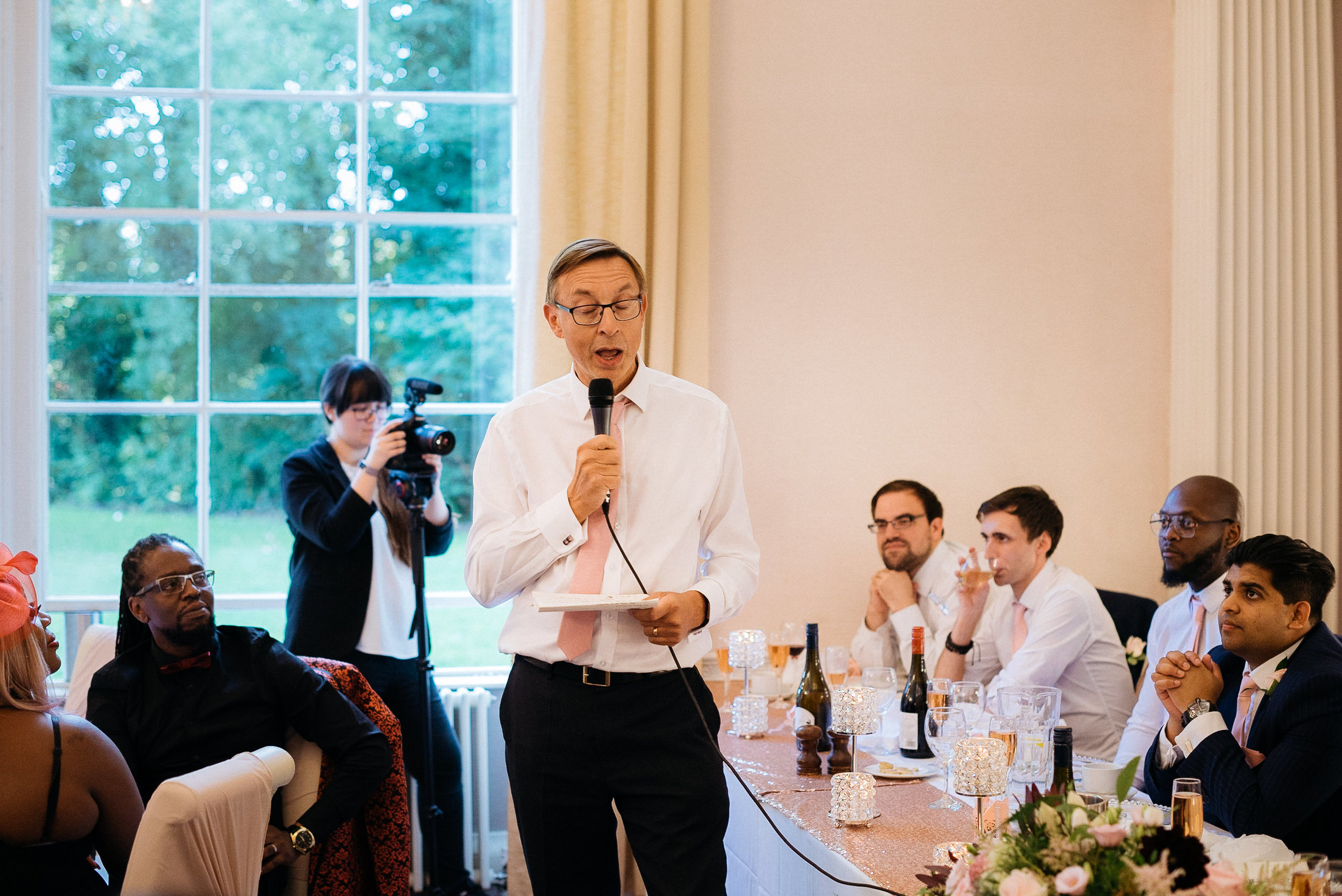 father of the groom makes a wedding speech at Colwick Hall wedding