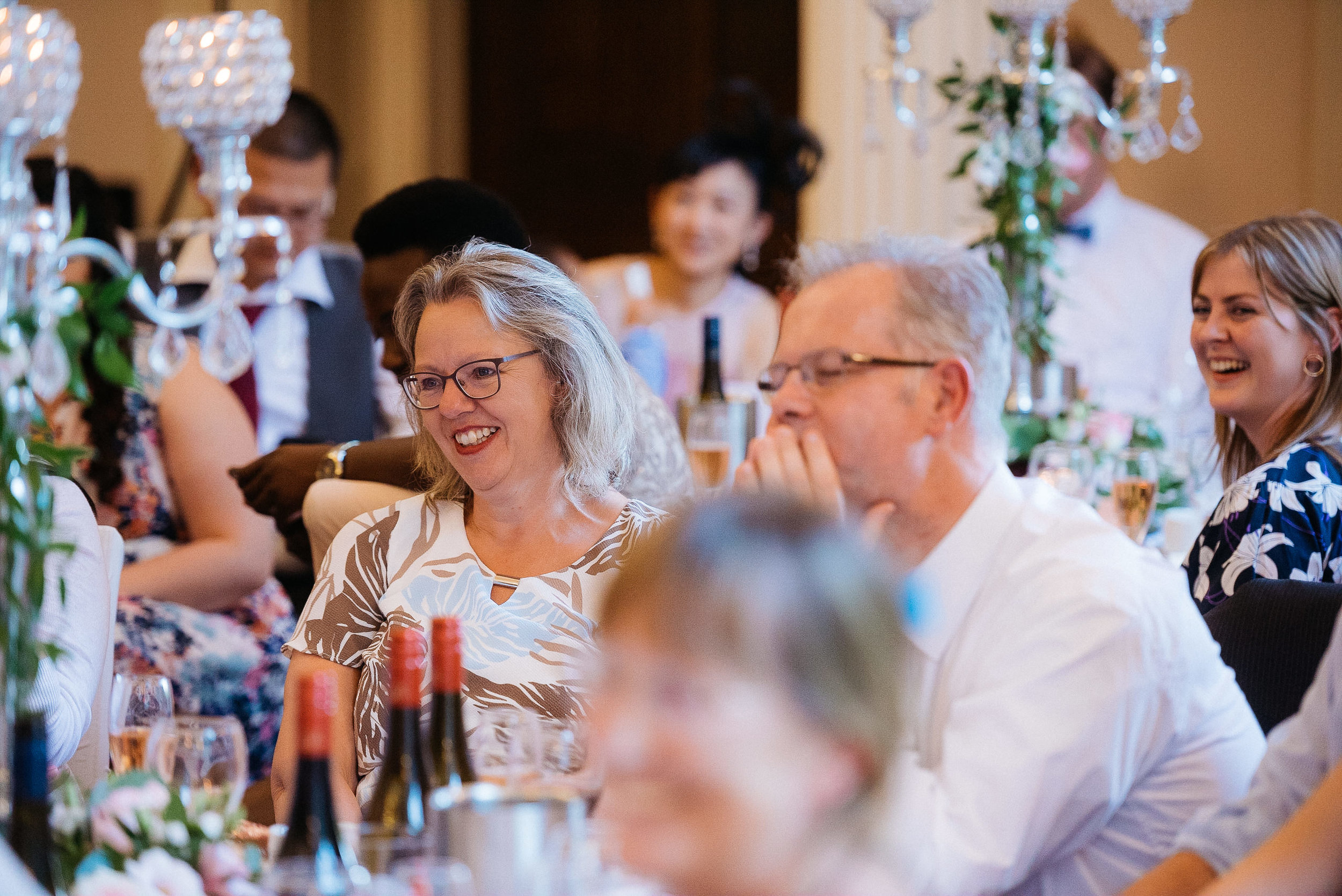 Wedding guests enjoying the speeches