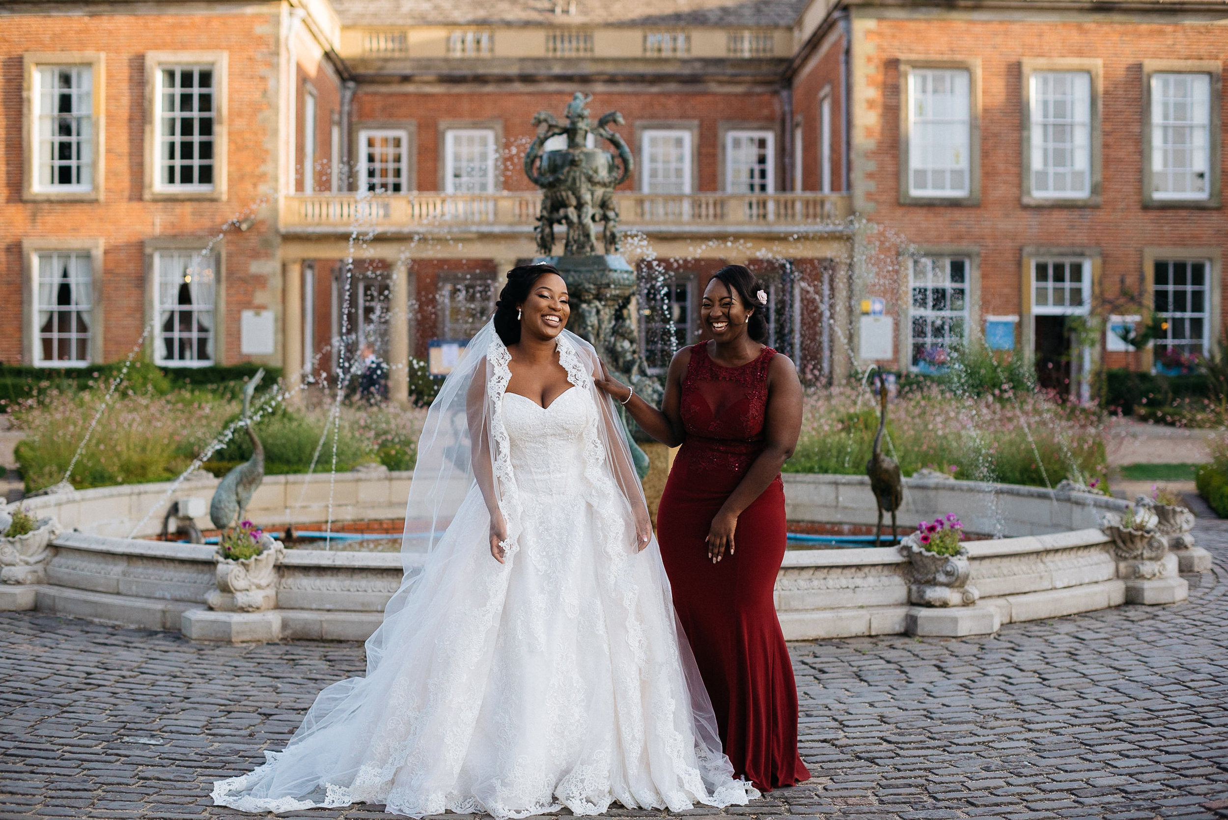 bride and her friend laughing