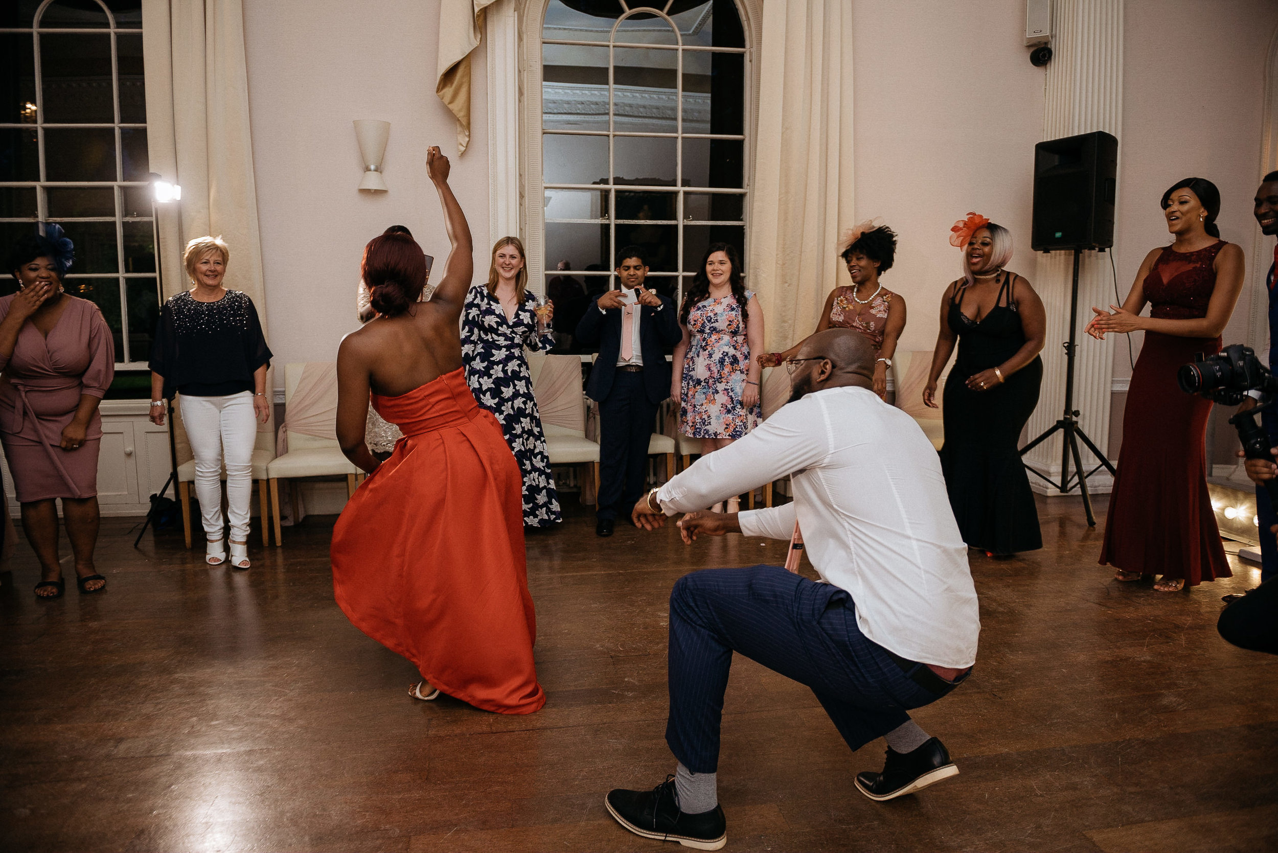 Wedding guests having fun dancing