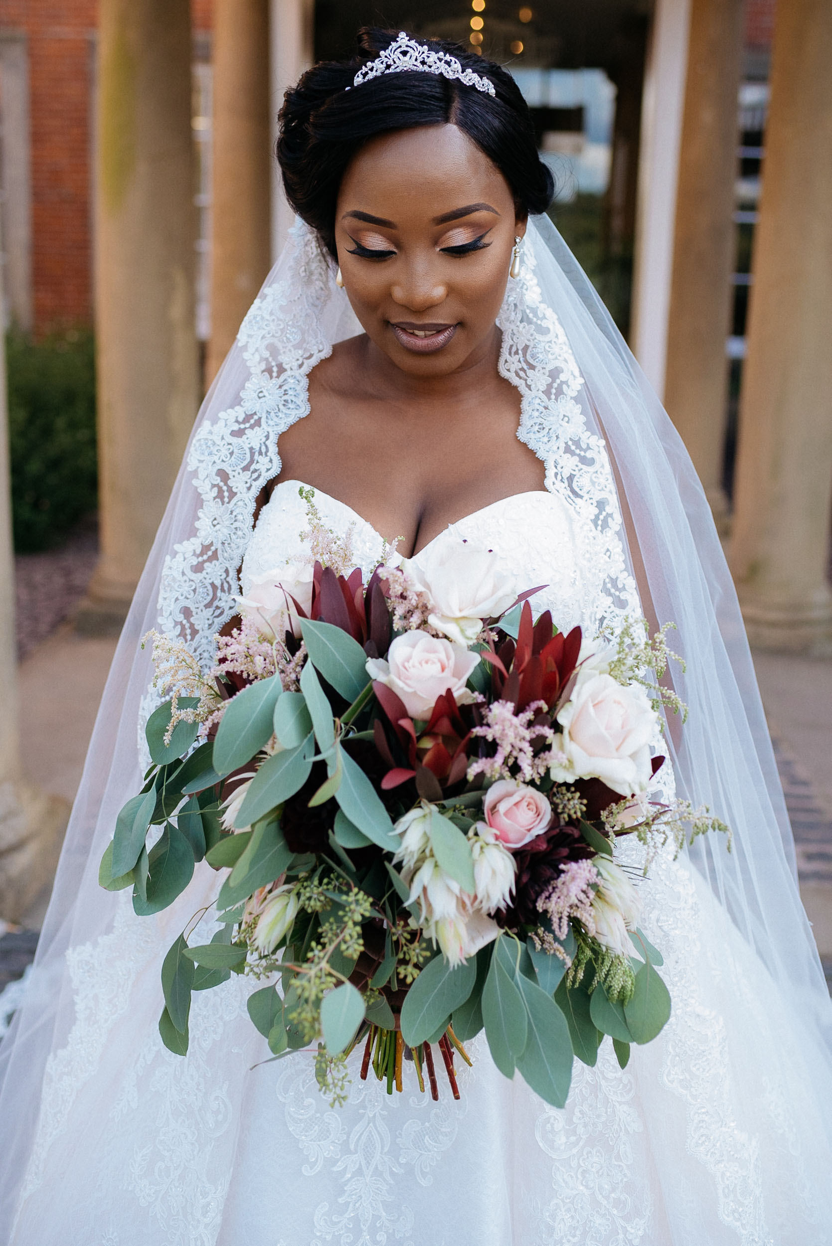 Bride and her bouquet at Colwick Hall wedding