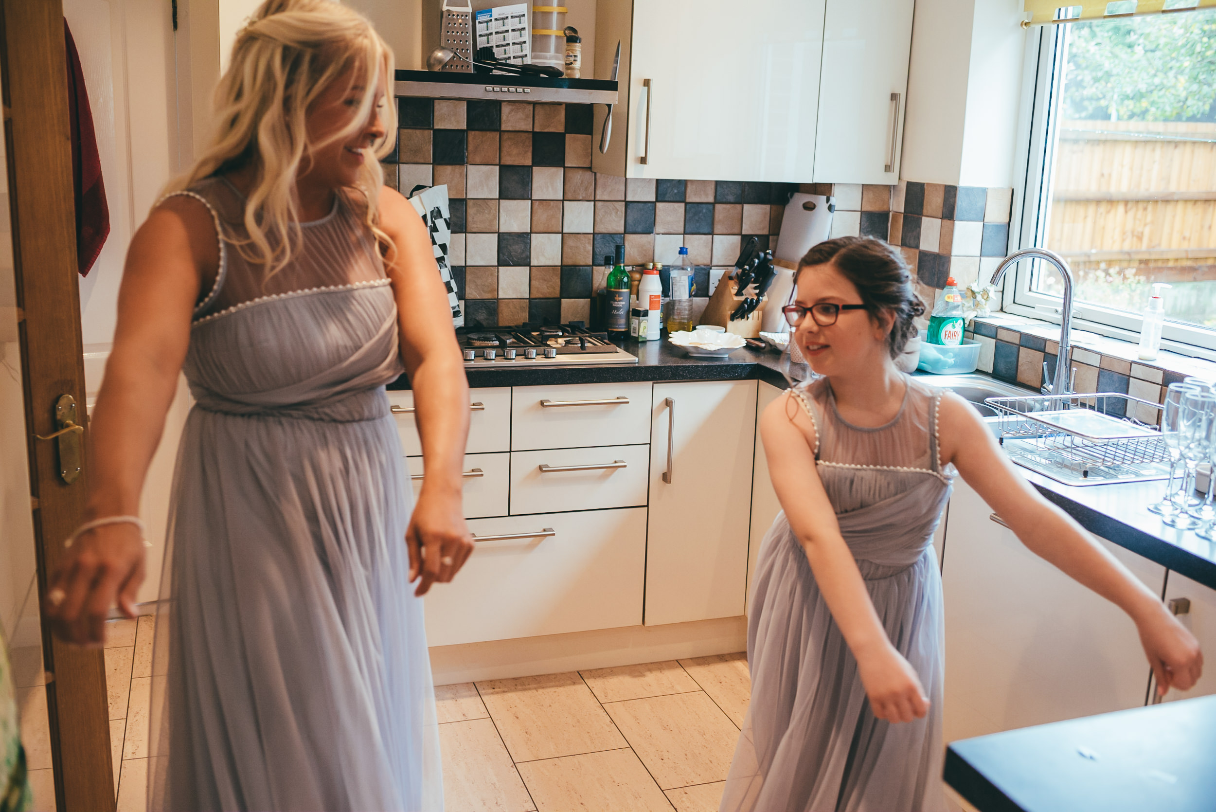 Bridesmaids dancing the floss