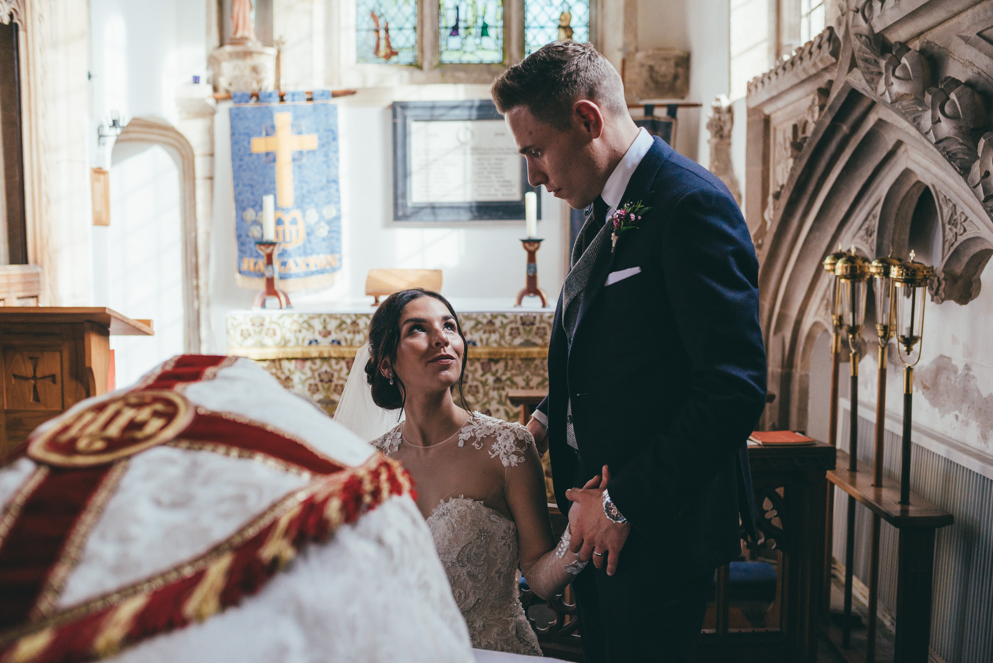 bride and groom signing the wedding register