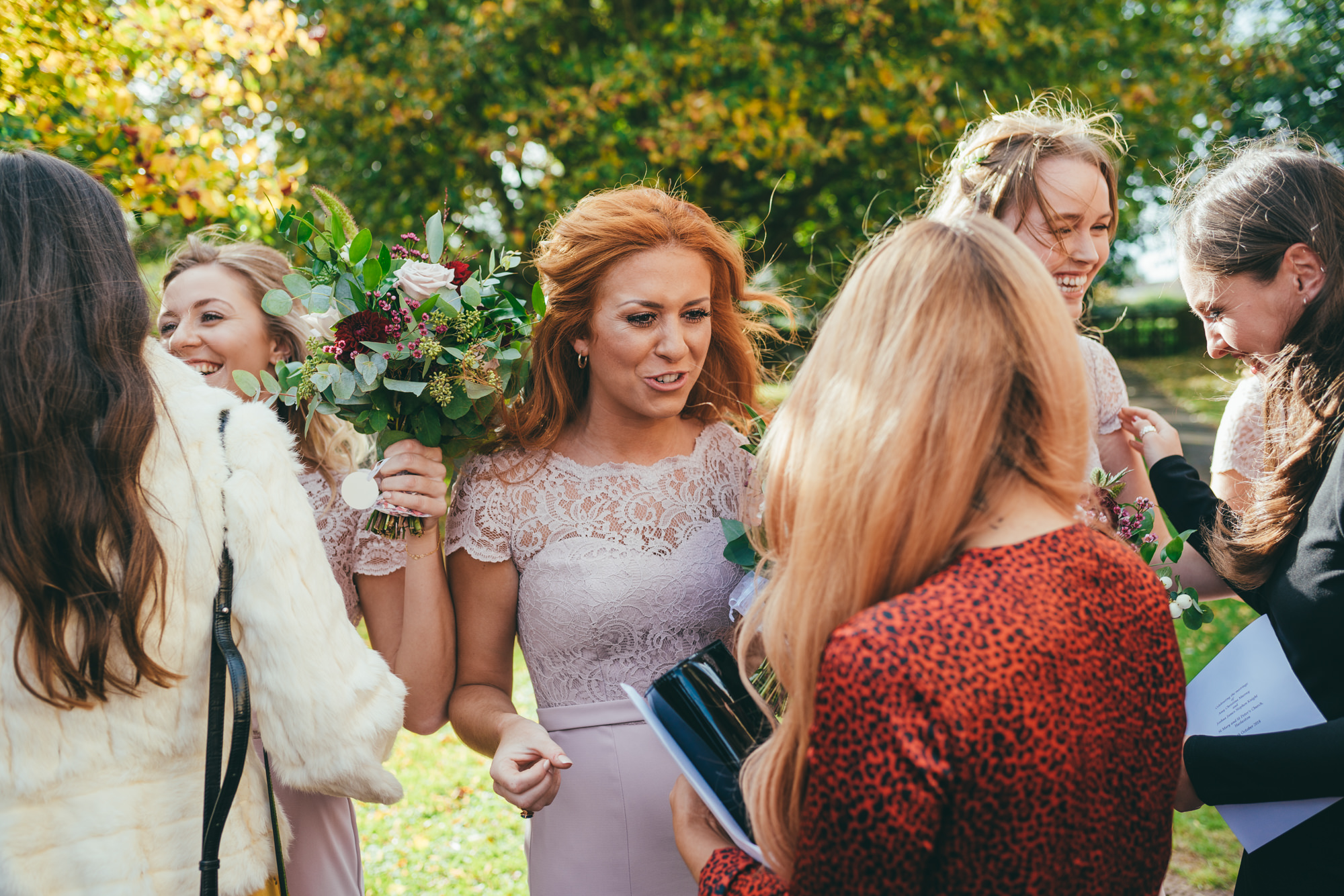 bridesmaid talking to guests