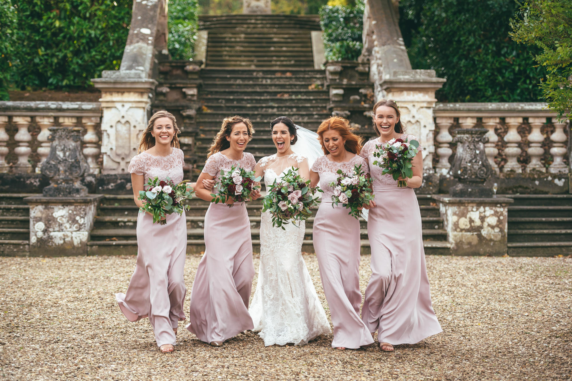 bridesmaids walking together having fun