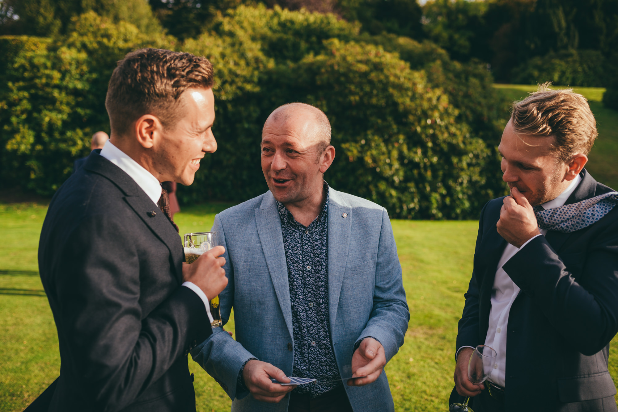 magician talking with the groom