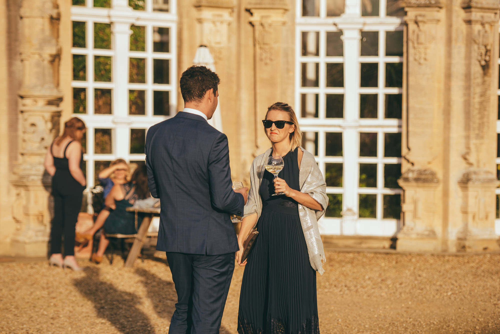 couple having a drink in the sunshine