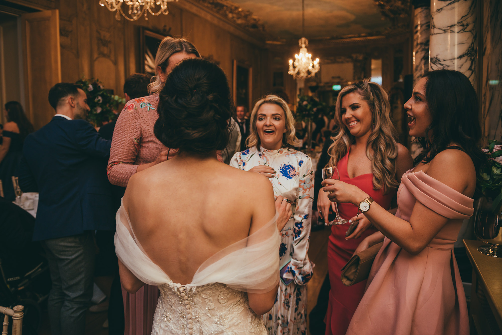 bride laughing with her friends
