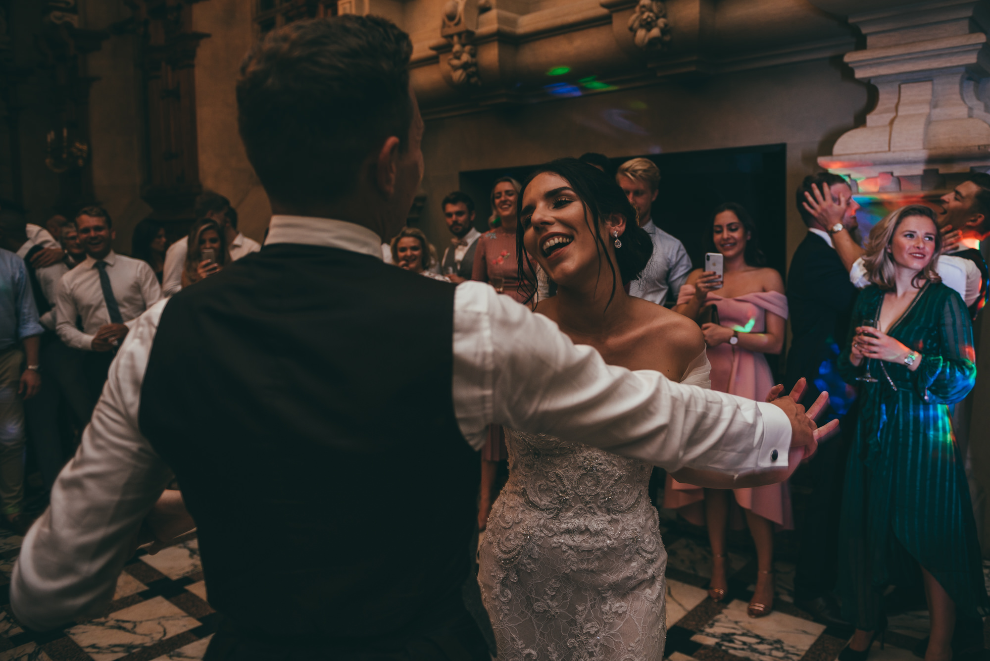 bride and groom dancing together
