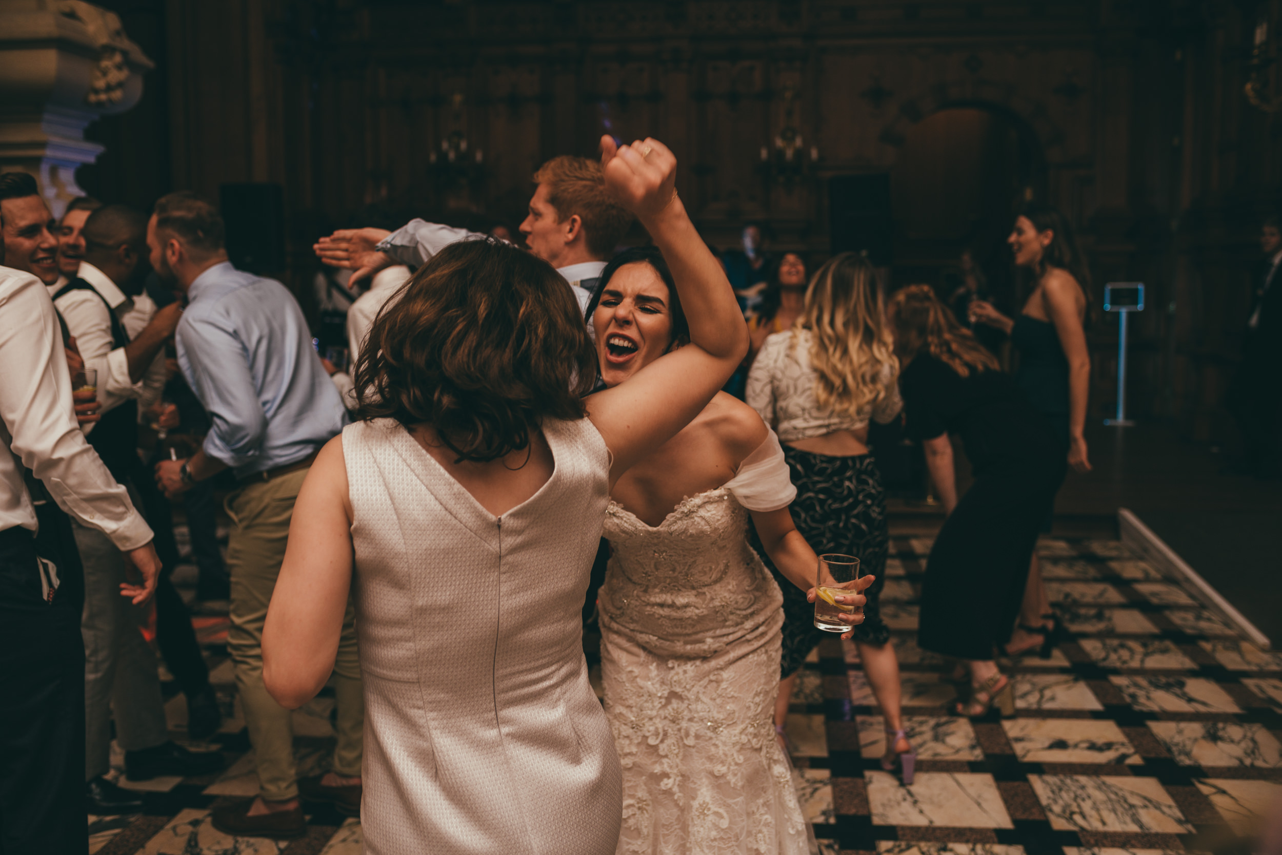 bride and her other dancing at harlaxton manor