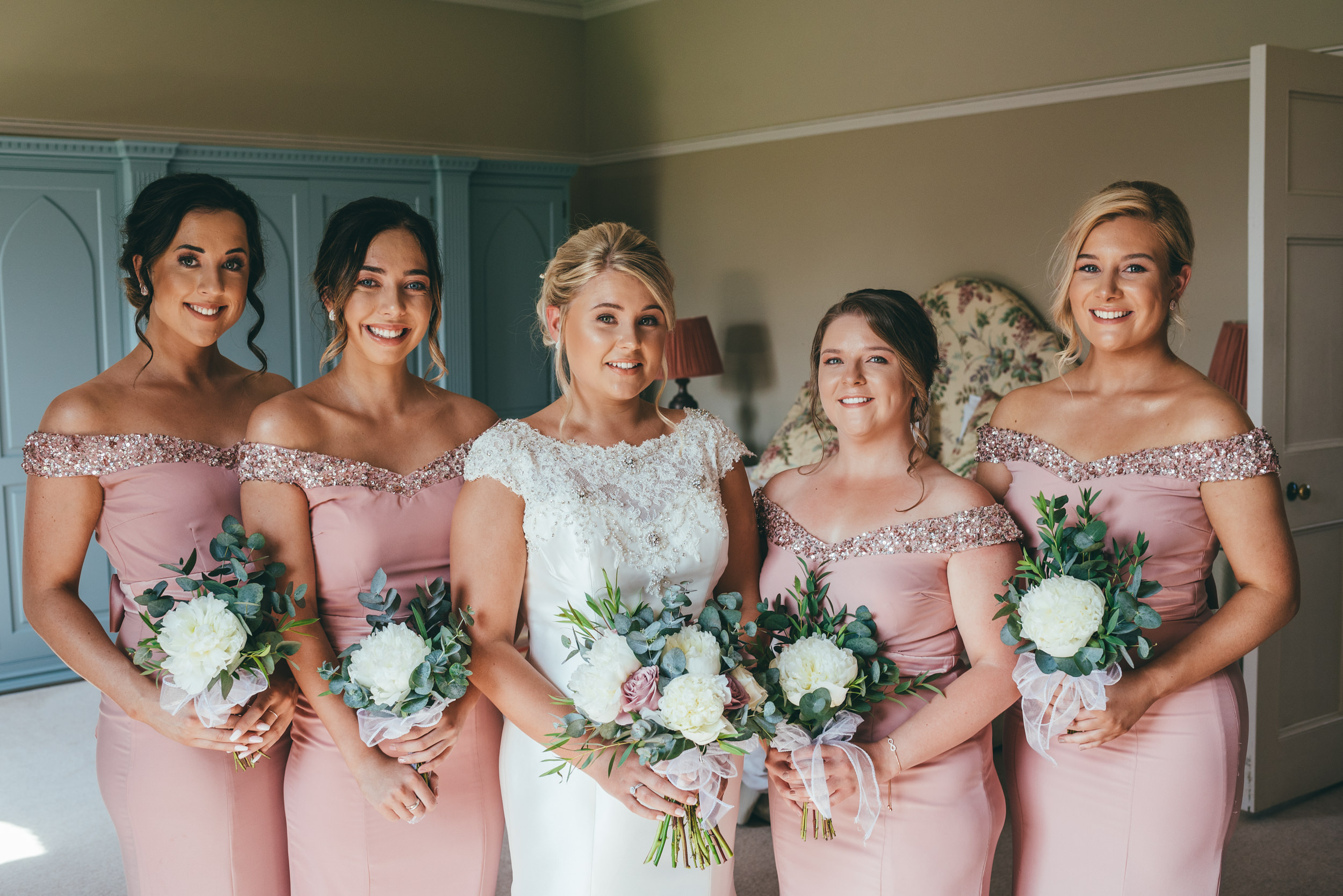 group photograph of the bride and bridemaids at yeldersley hall