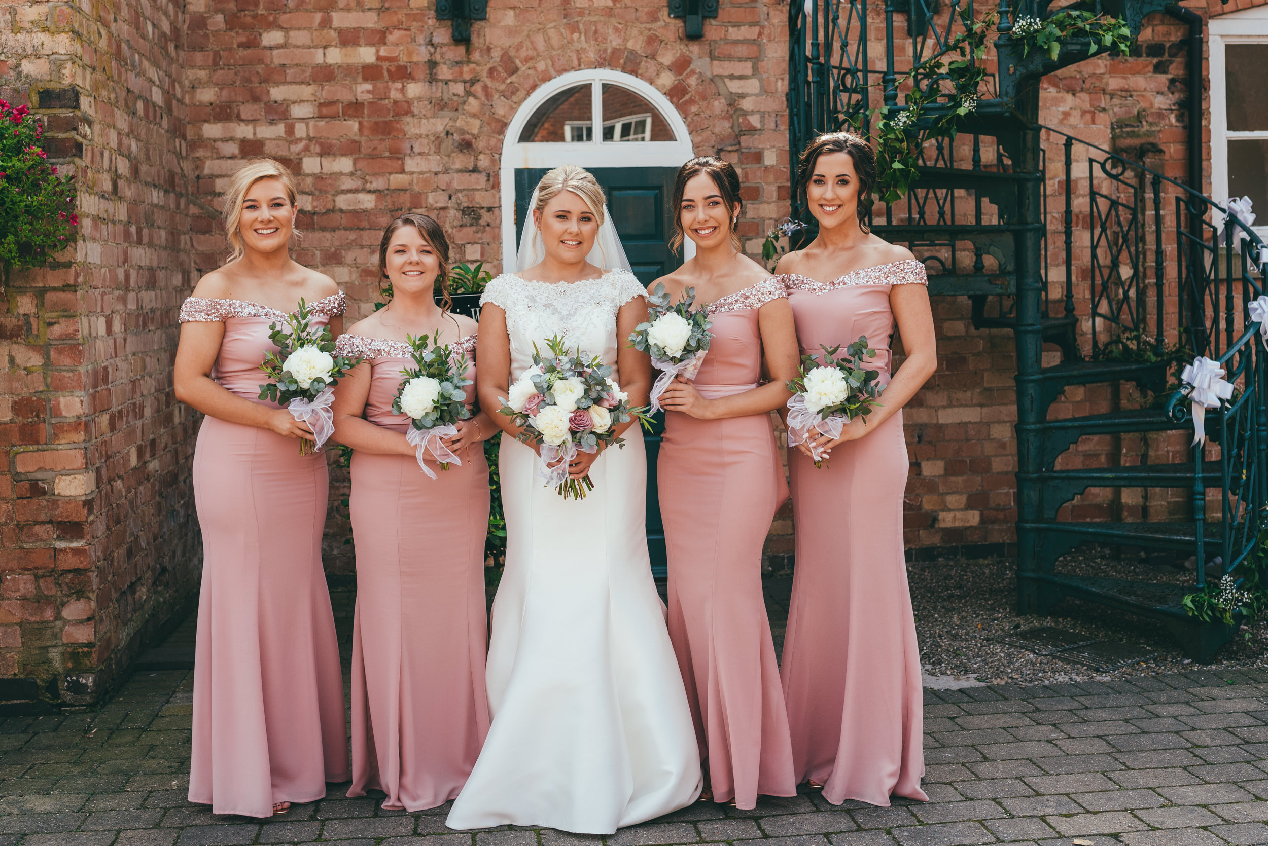 group photograph of the bride and her bridesmaids