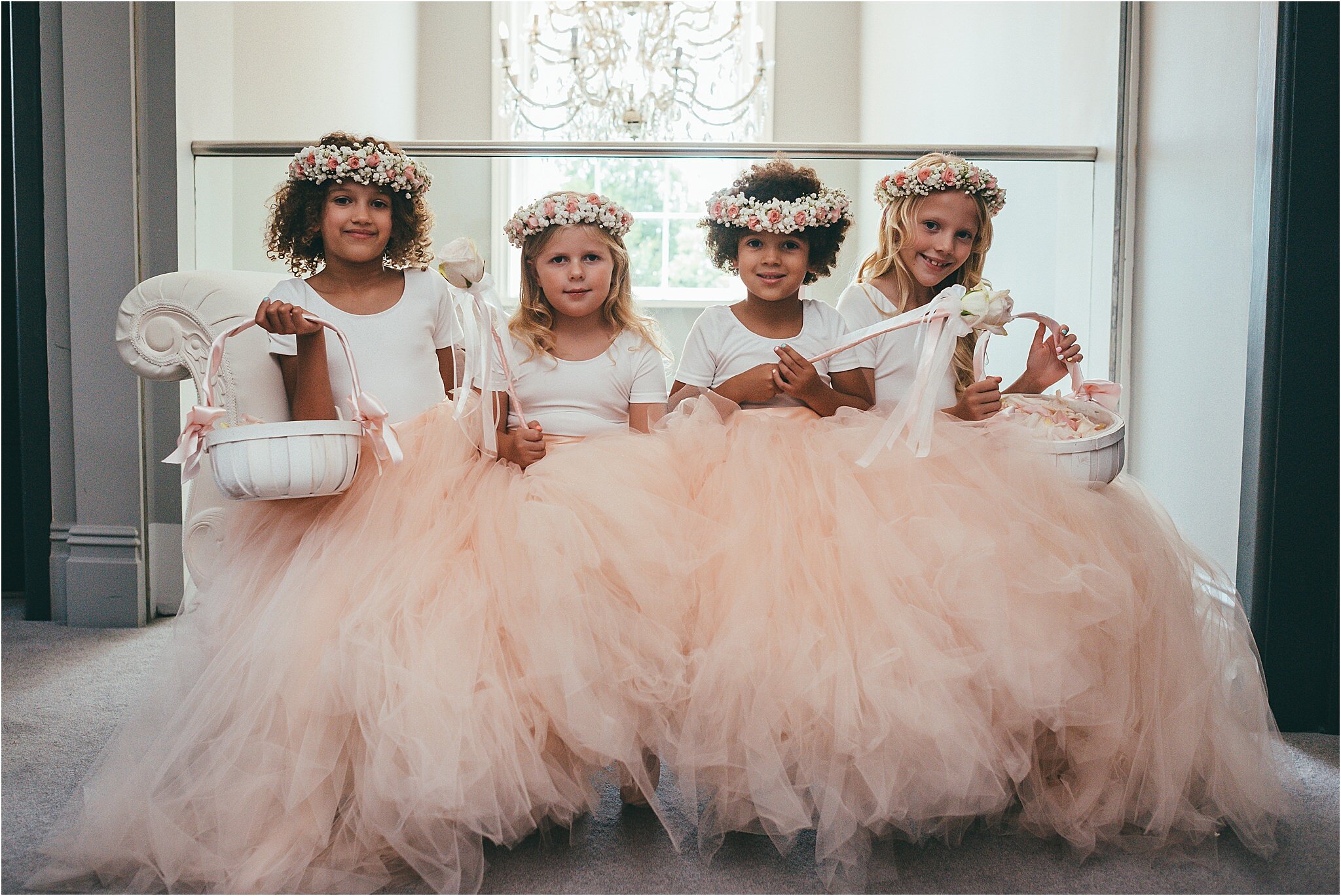 bridesmaids sitting on a chaise lounge at the old vicarage boutique hotel 