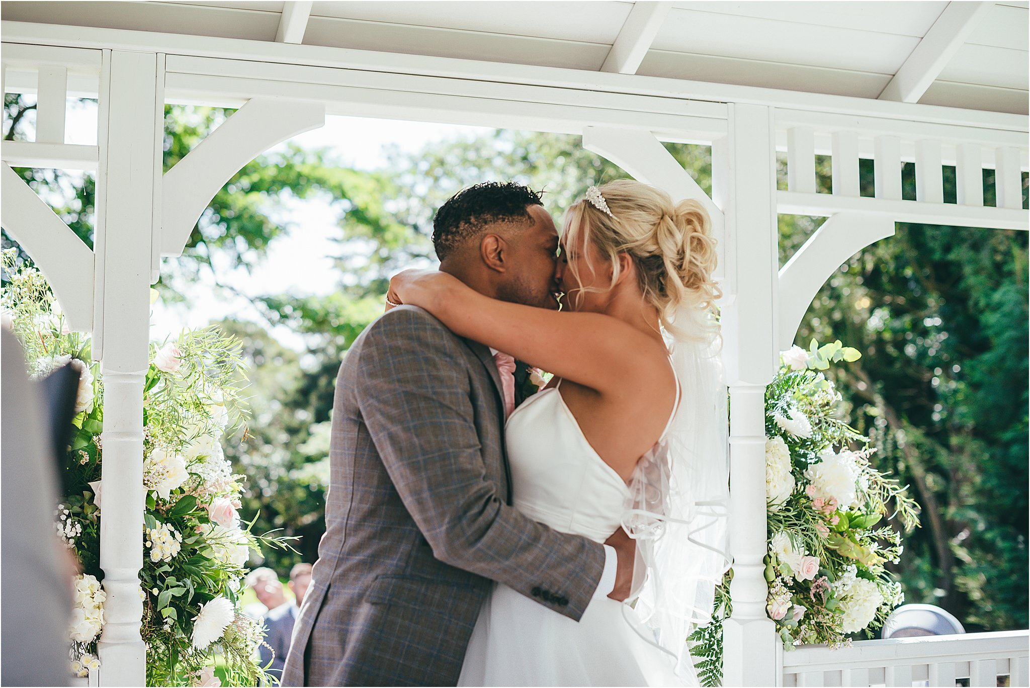 bride and groom kissing 