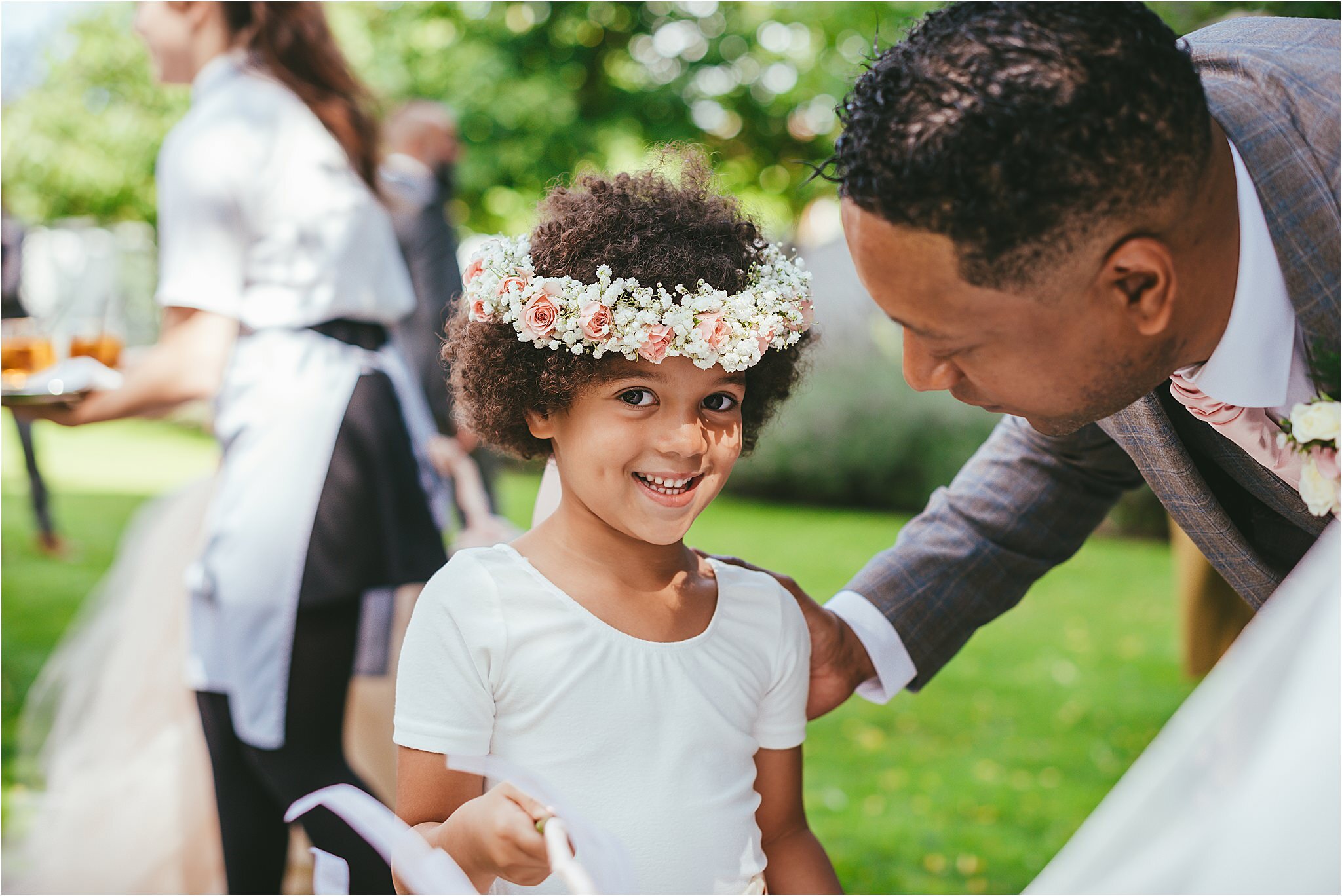 bridesmaid talking with her father