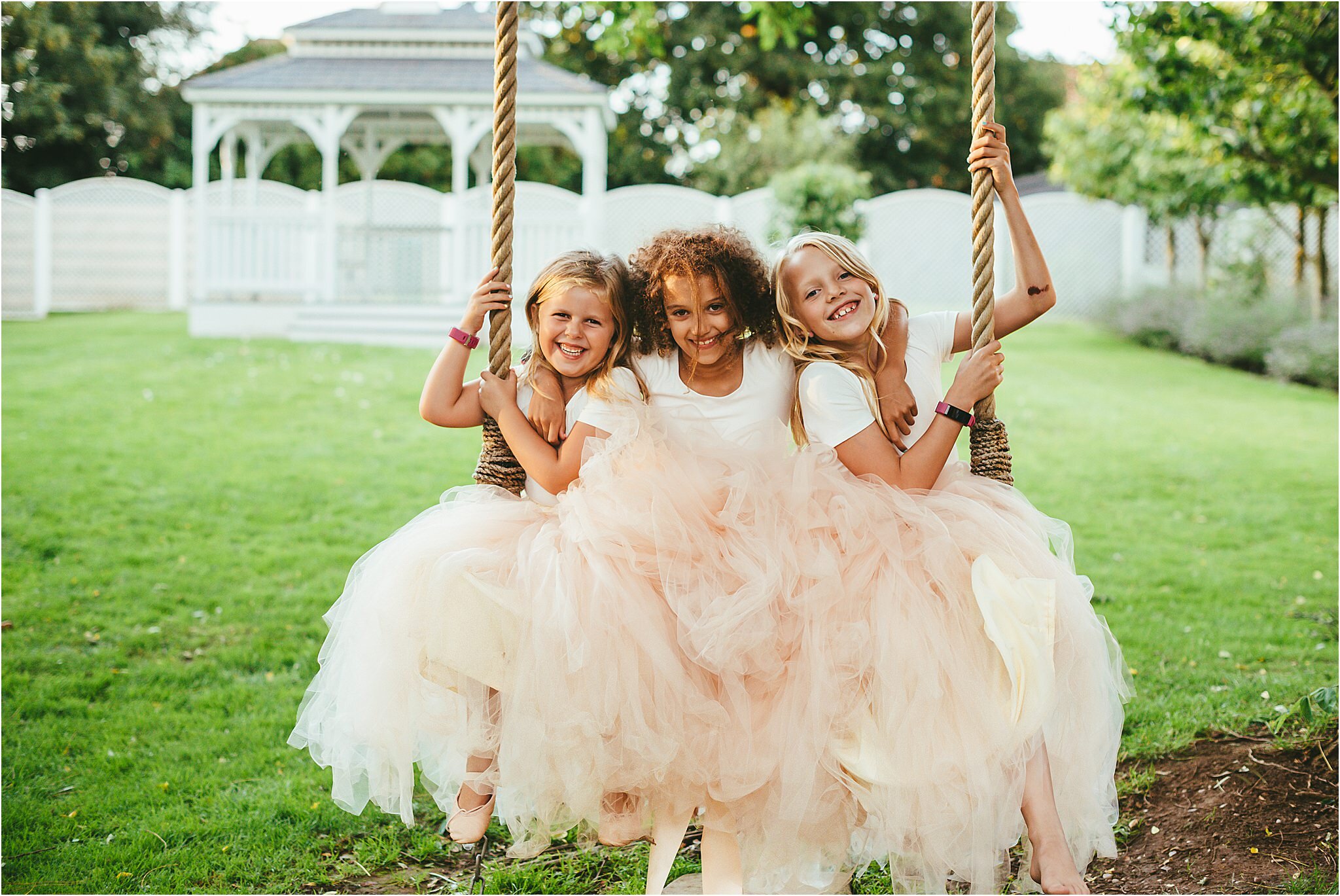 bridesmaids on a rope swing at the old vicarage boutique hotel
