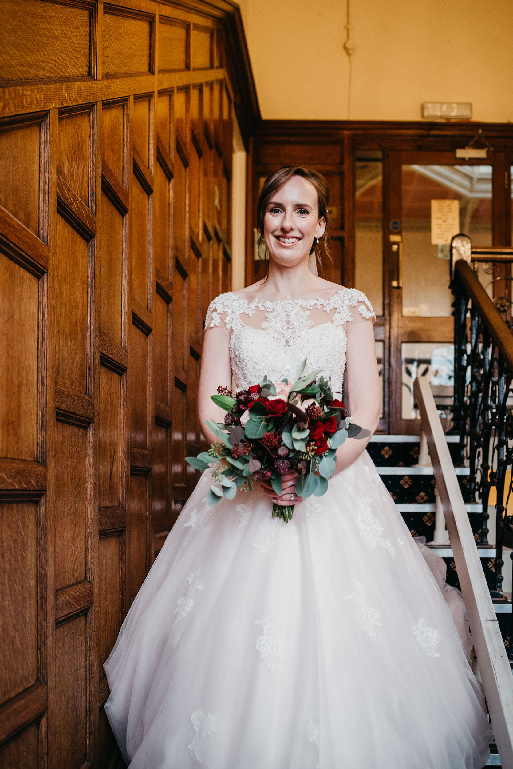 bride on the stairs at Bestwood Lodge 