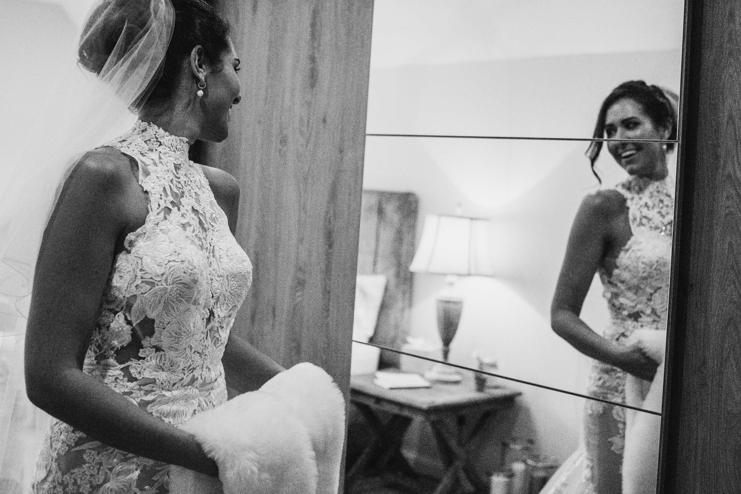 brides reflection in the mirror during bridal preparation