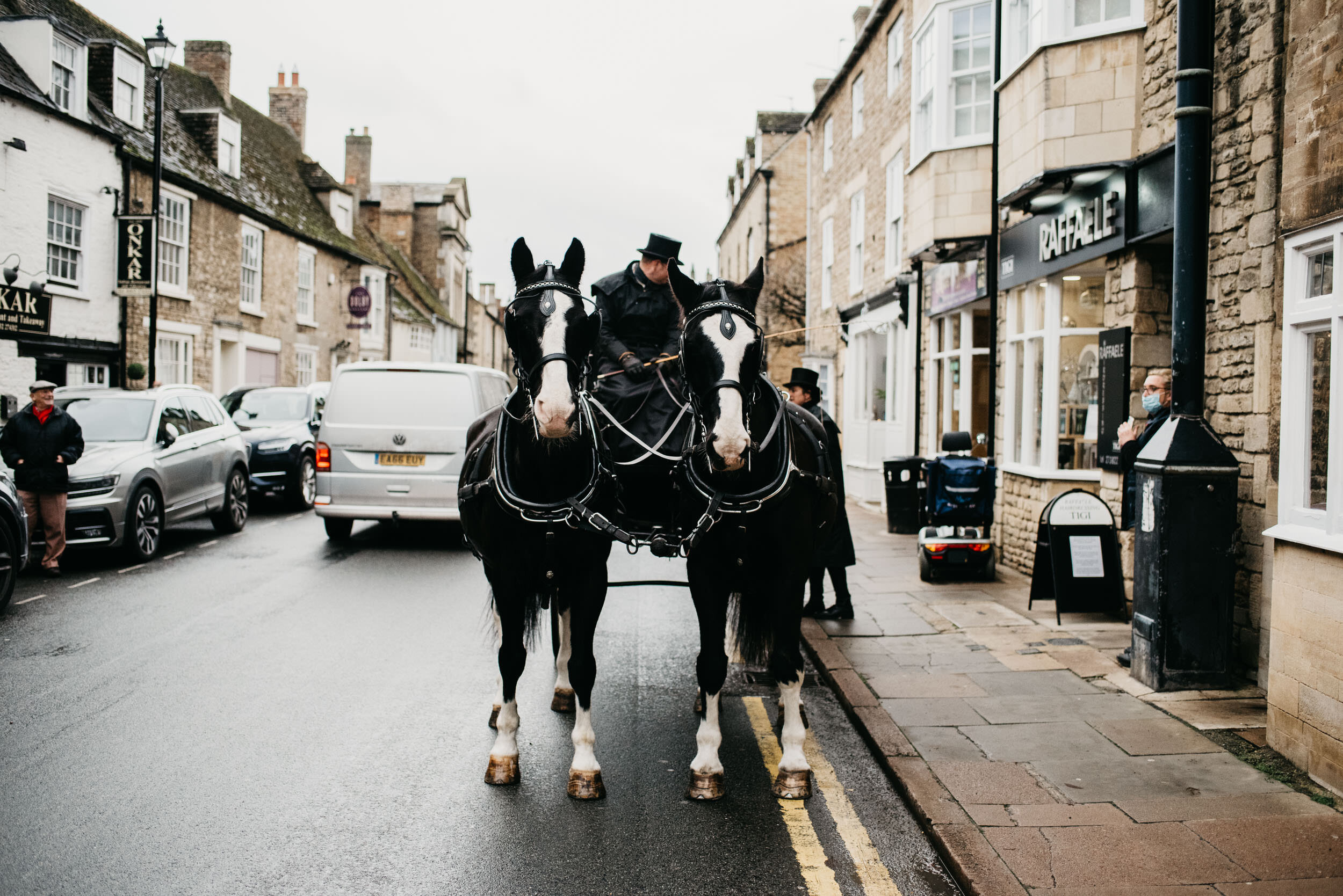 bridesmaids travelling to church in a horse and carriage