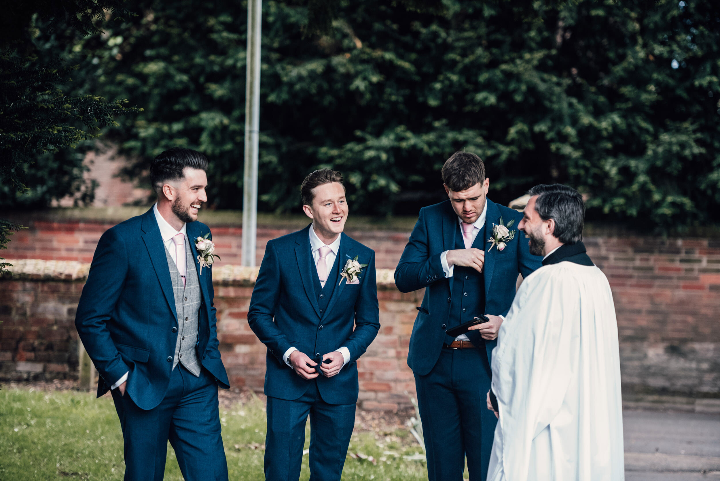 groomsman chat with the vicar