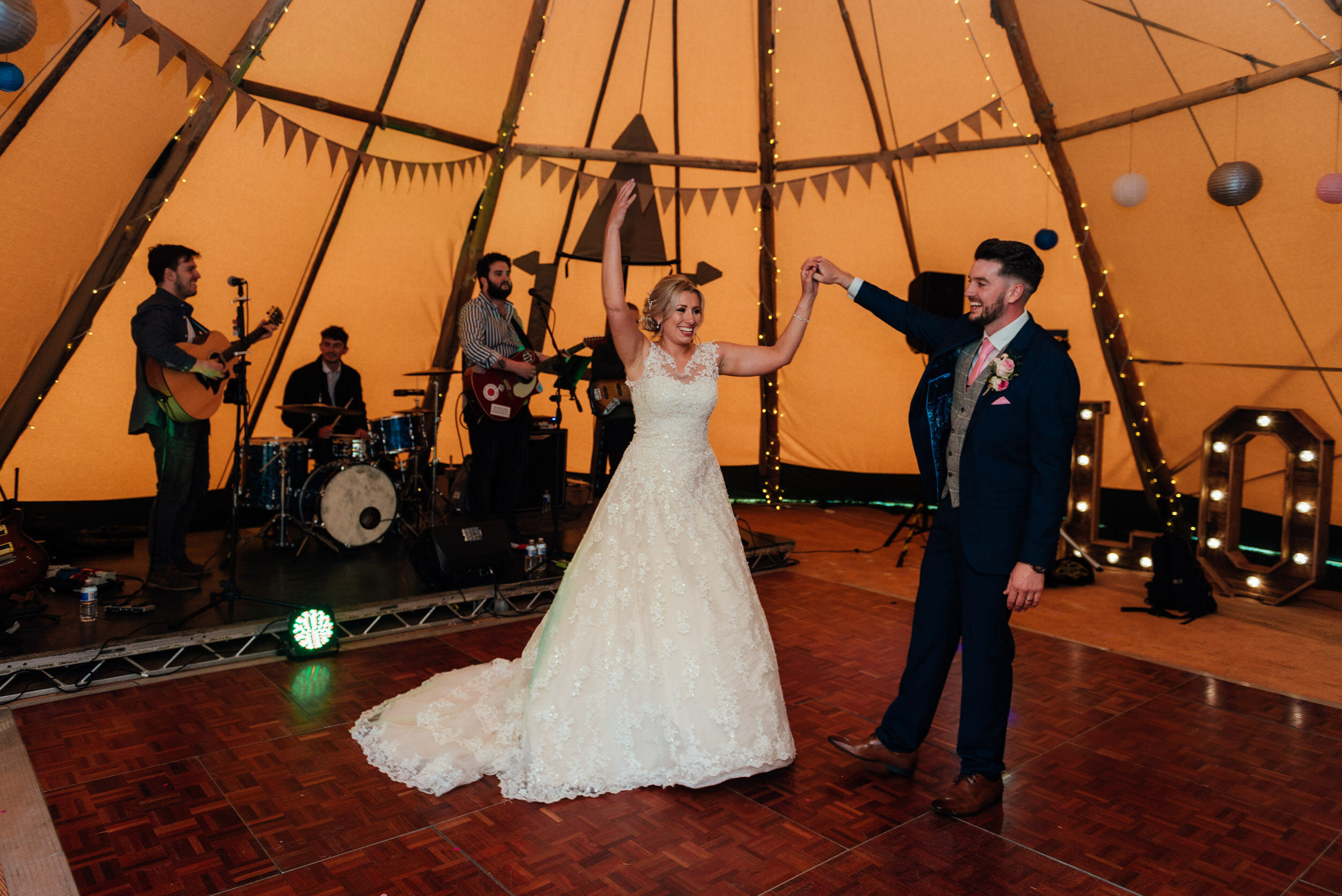 bride and groom dancing