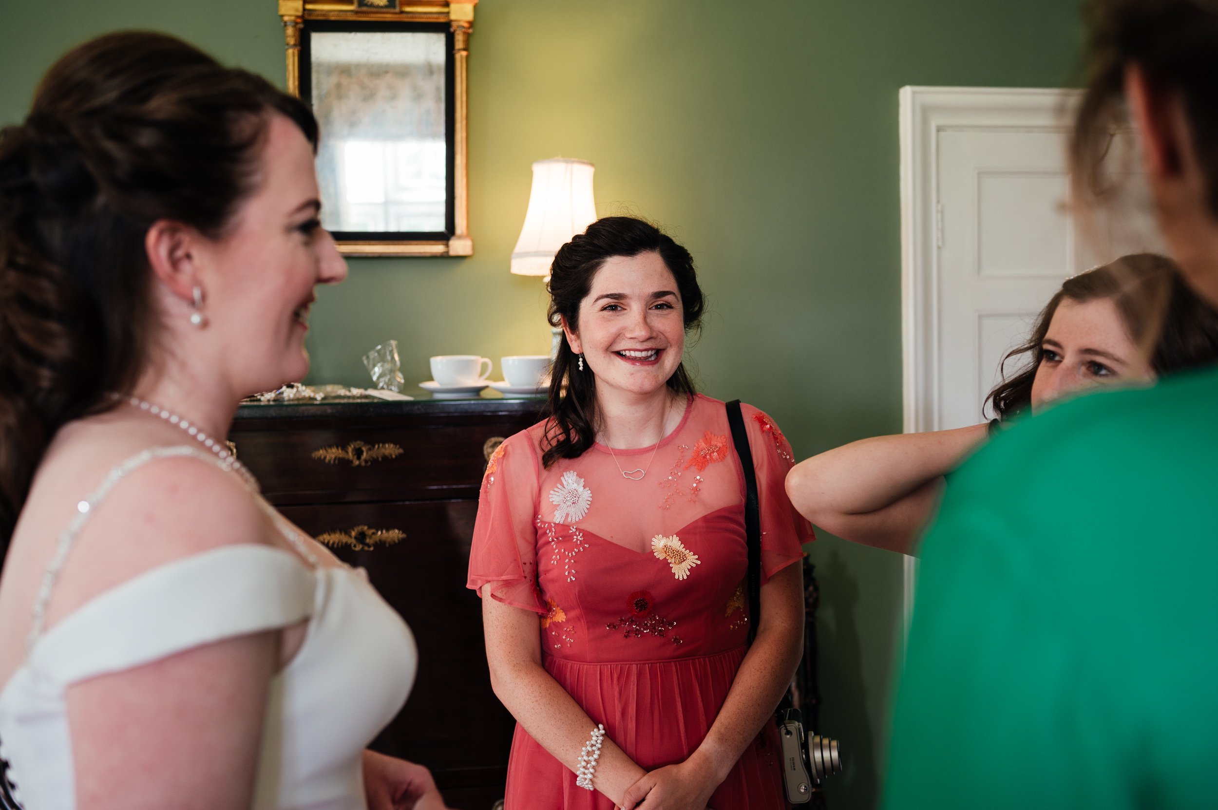 bridesmaids sharing a joke