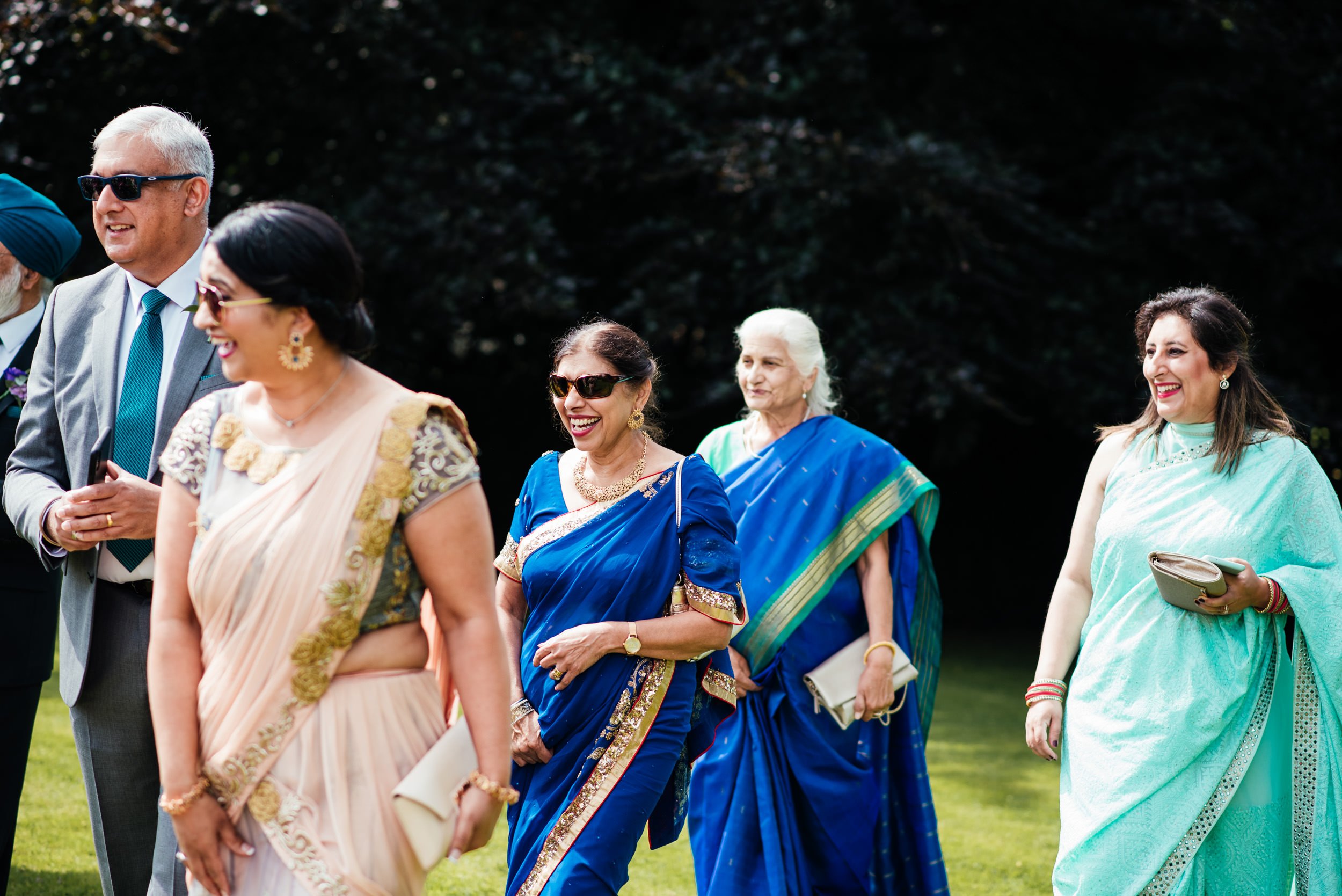 wedding guests arriving at the ceremony