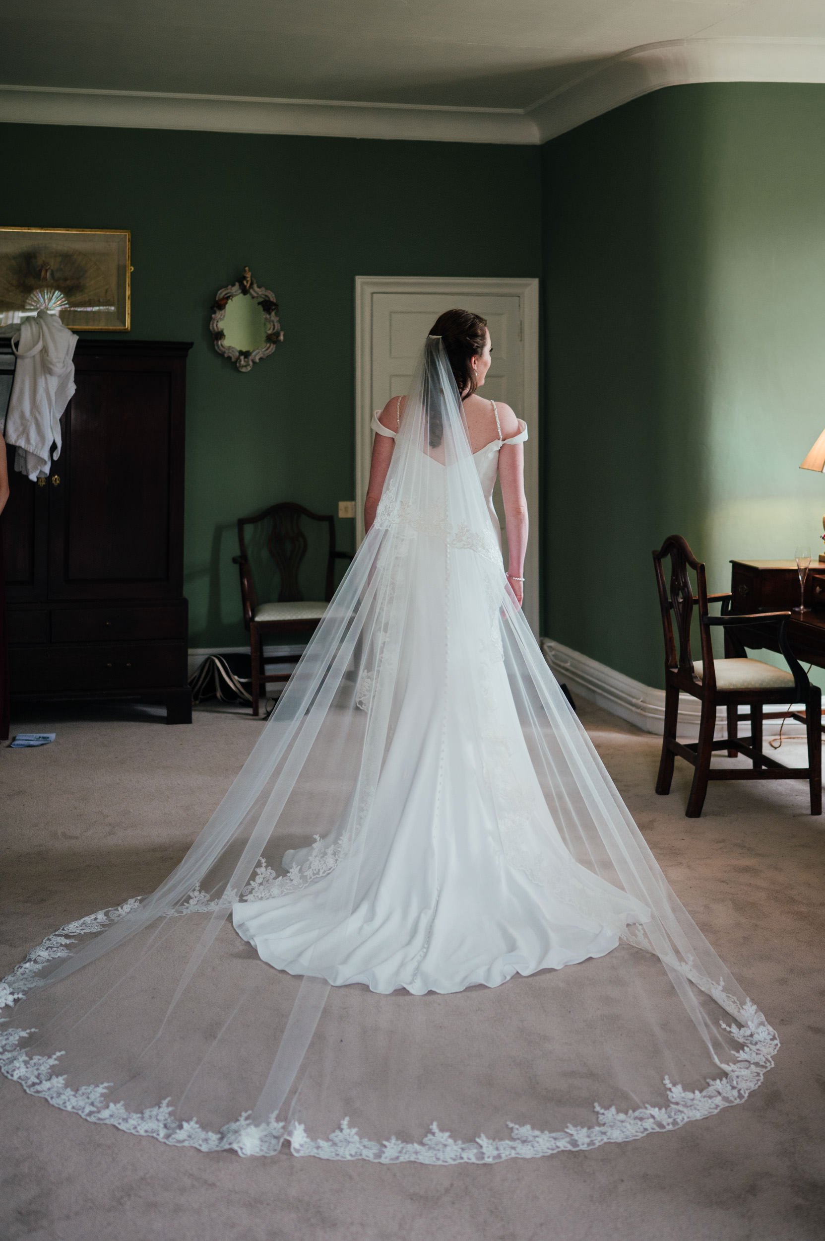 bridal portrait of the bride in her wedding dress and veil