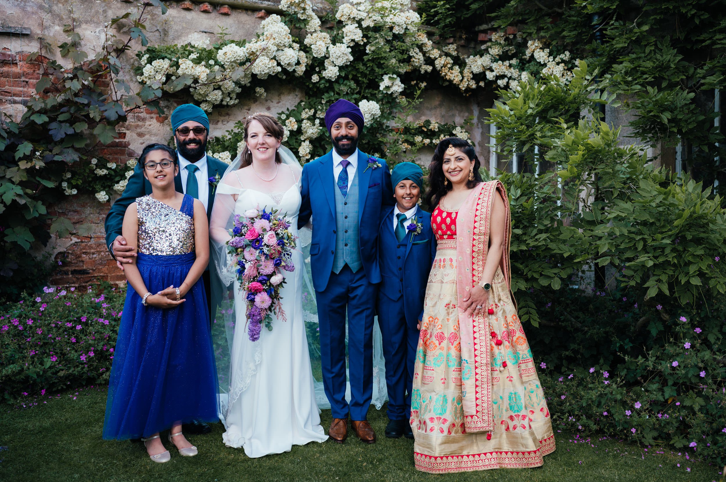 family photograph in the flower garden at holme pierrepont hall