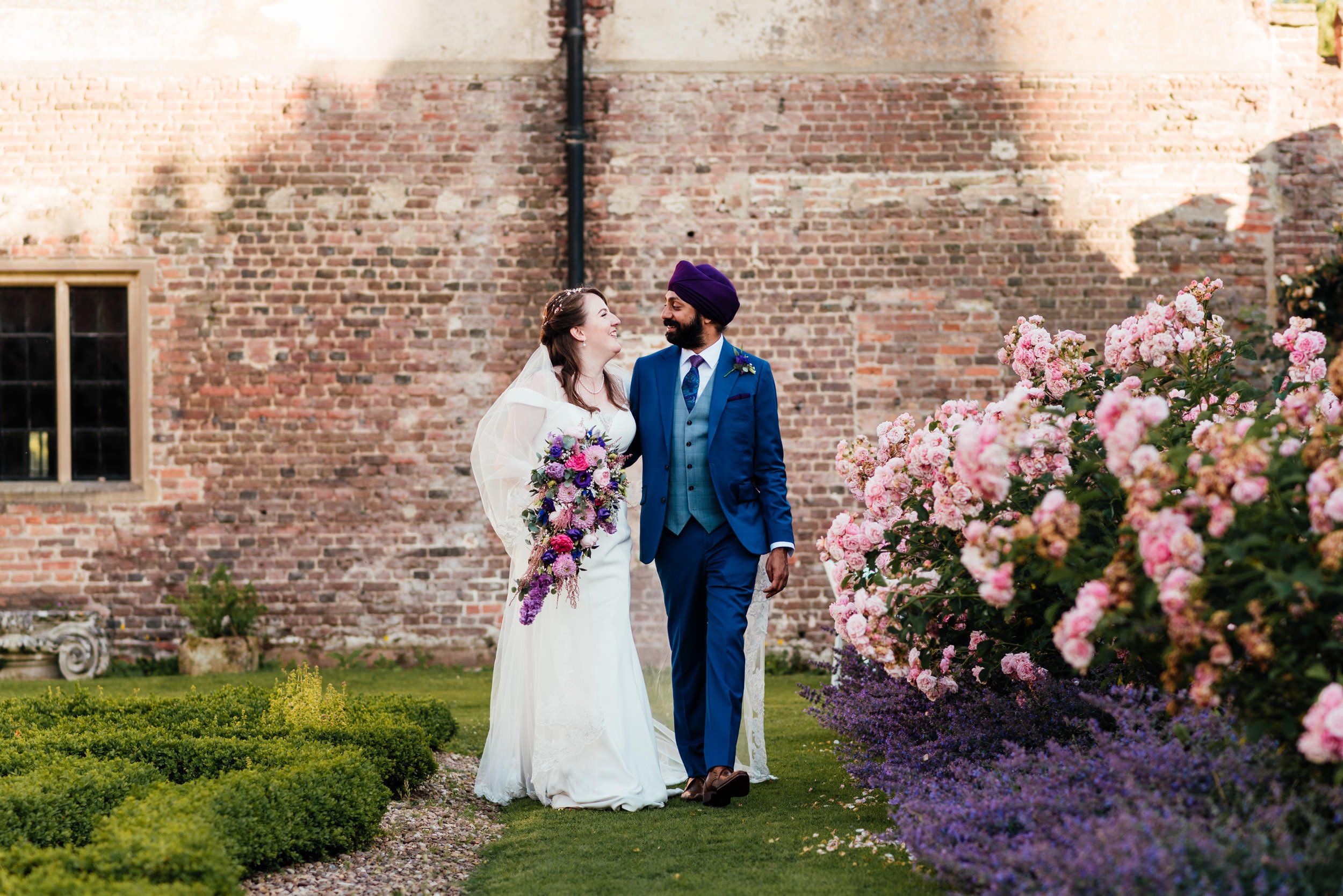 bride and groom portrait in the gardens at holme pierrepont hall