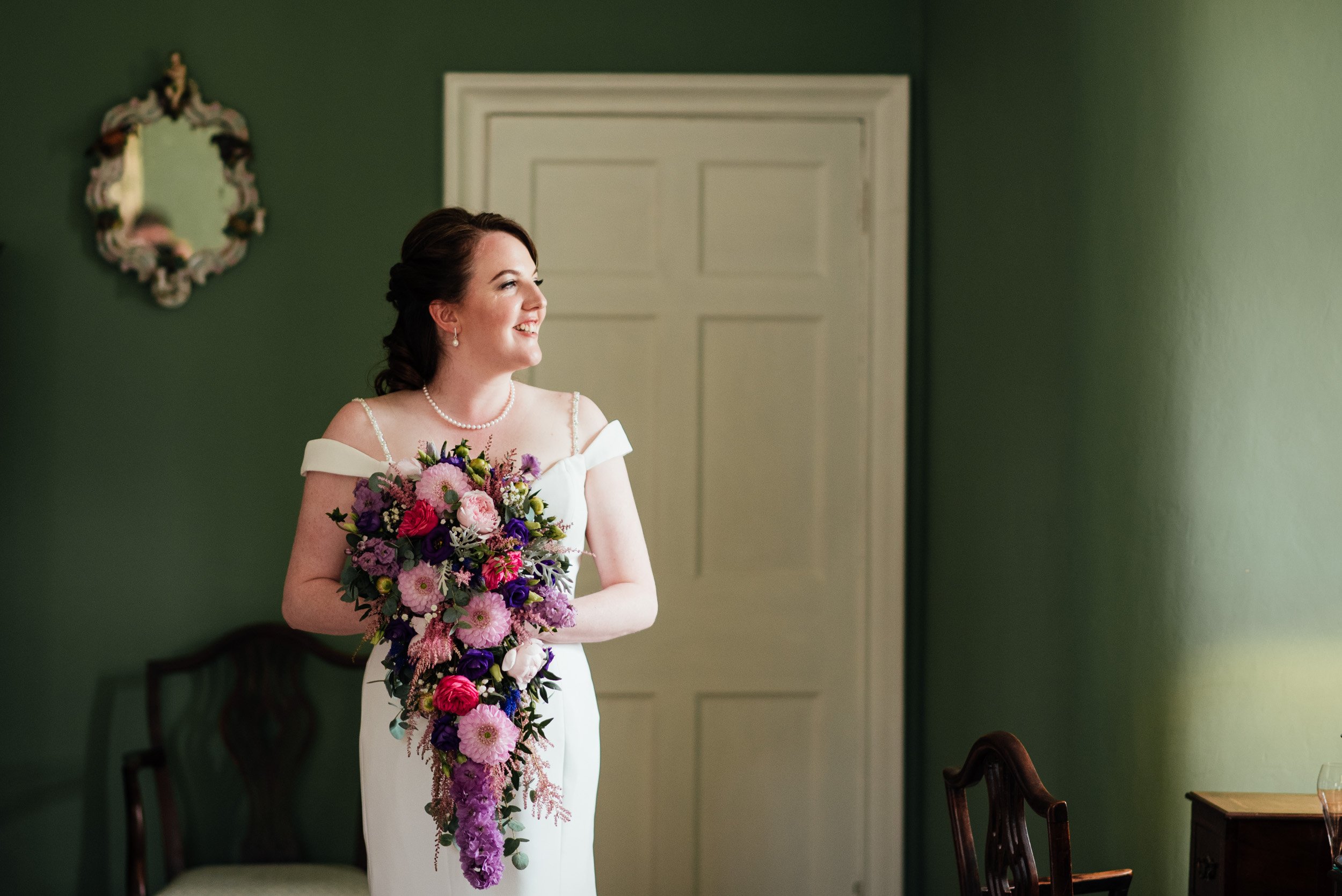 portrait of the bride looking out of the window