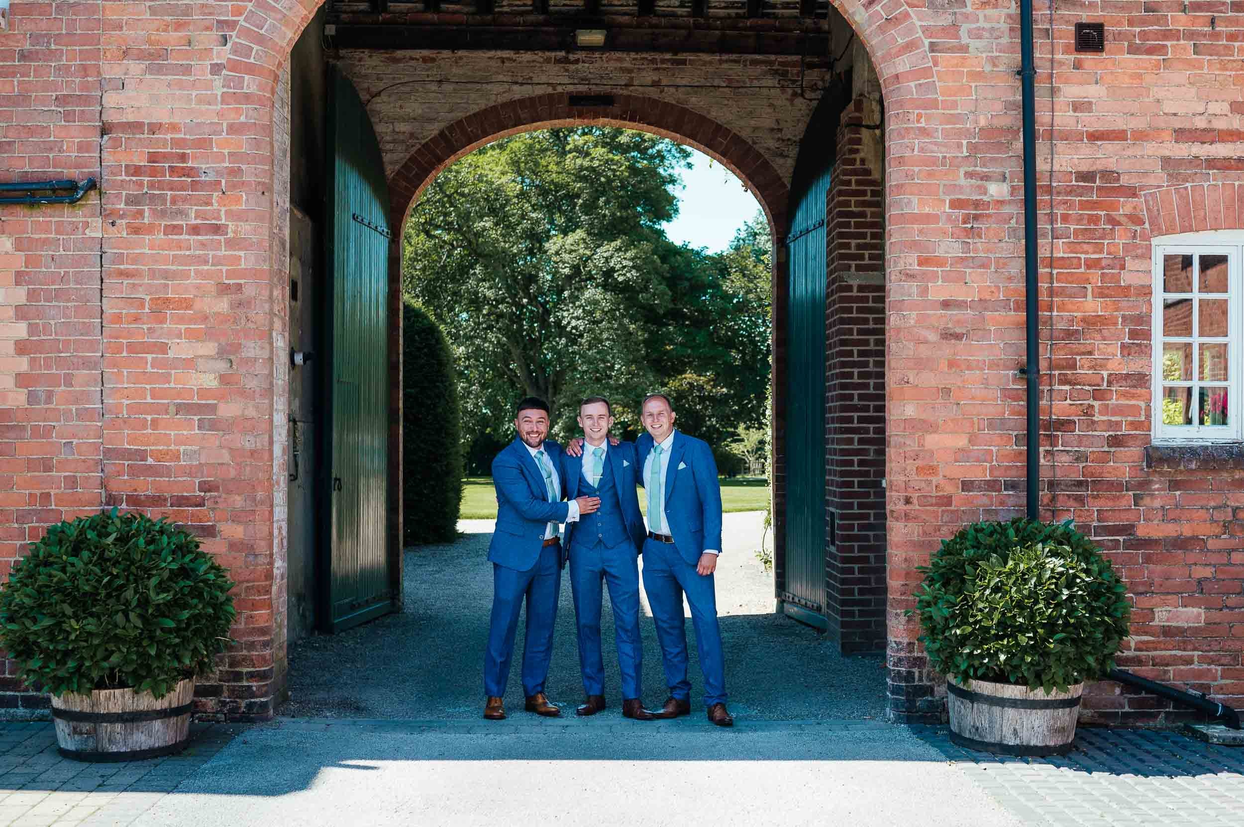 groomsmen posing for a photograph